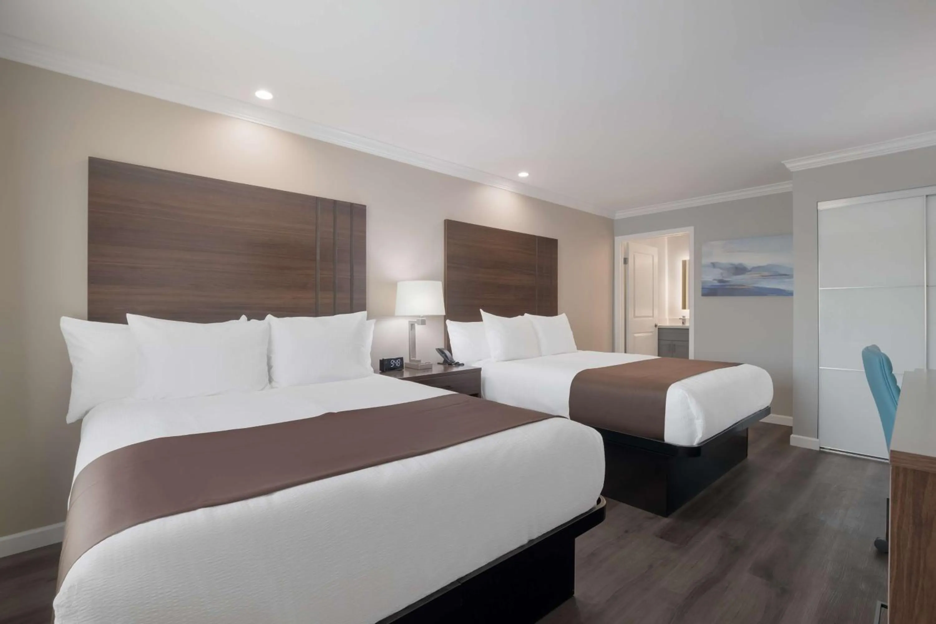 Queen Room with Two Queen Beds in SureStay Plus Hotel by Best Western Upland - Ontario North