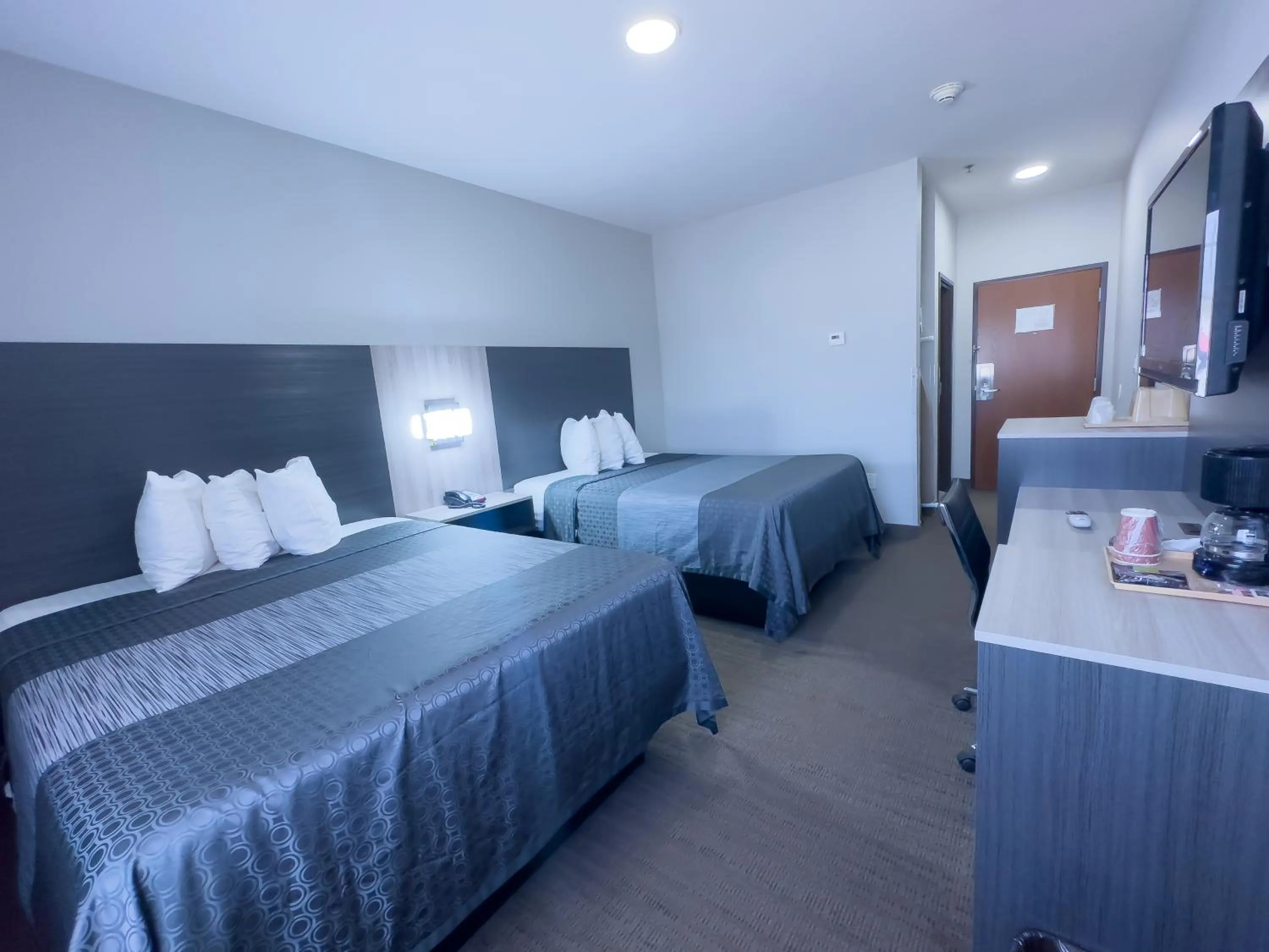 Queen Room with Two Queen Beds in American Inn Madill