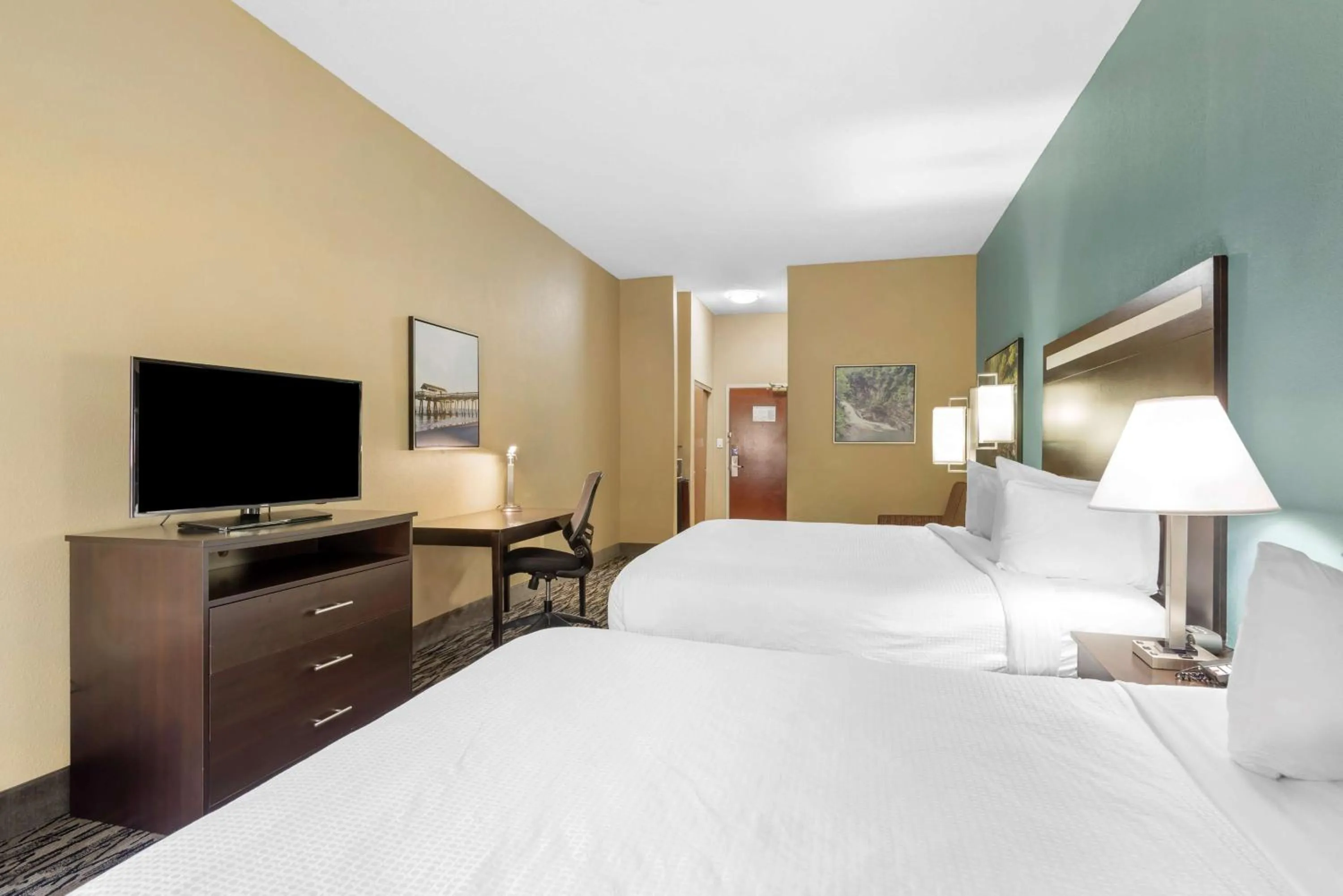 Queen Room with Two Queen Beds and Sofa in Best Western Plus McDonough Inn & Suites