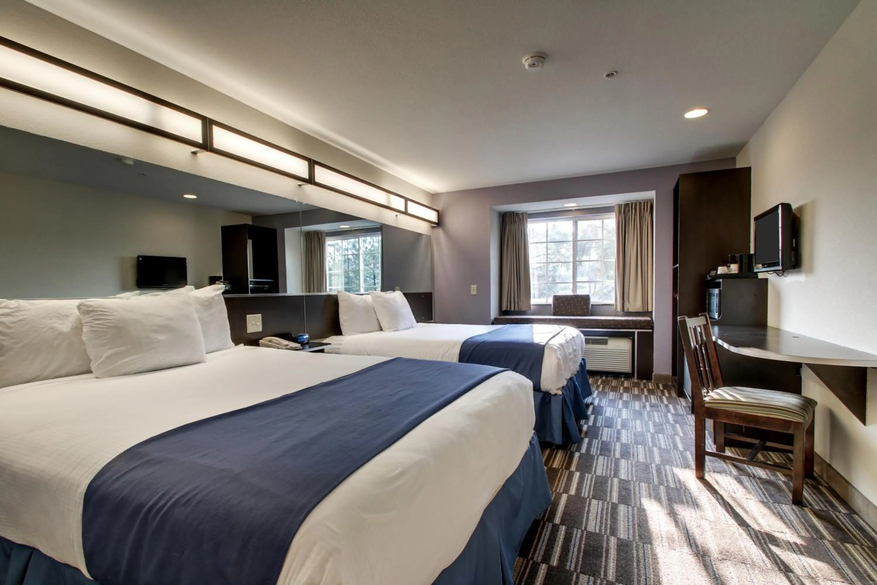 Queen Room with Two Queen Beds - Non-Smoking in Microtel Inn & Suites by Wyndham Tuscaloosa