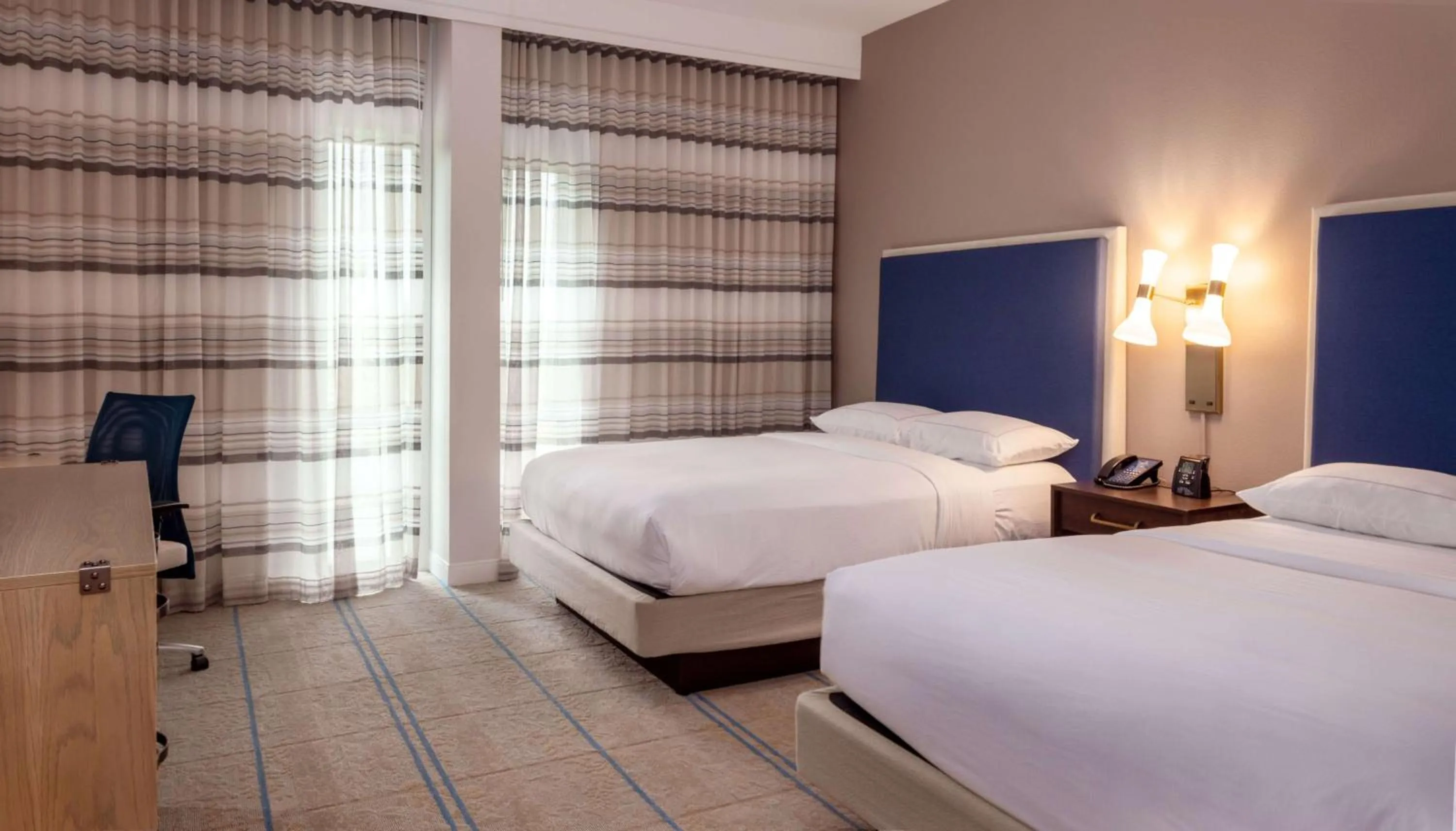 Queen Room with Two Queen Beds - Mobility and Hearing Access in Hilton Austin Airport