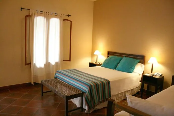 Deluxe Quadruple Room in Hostería Posada del Sol