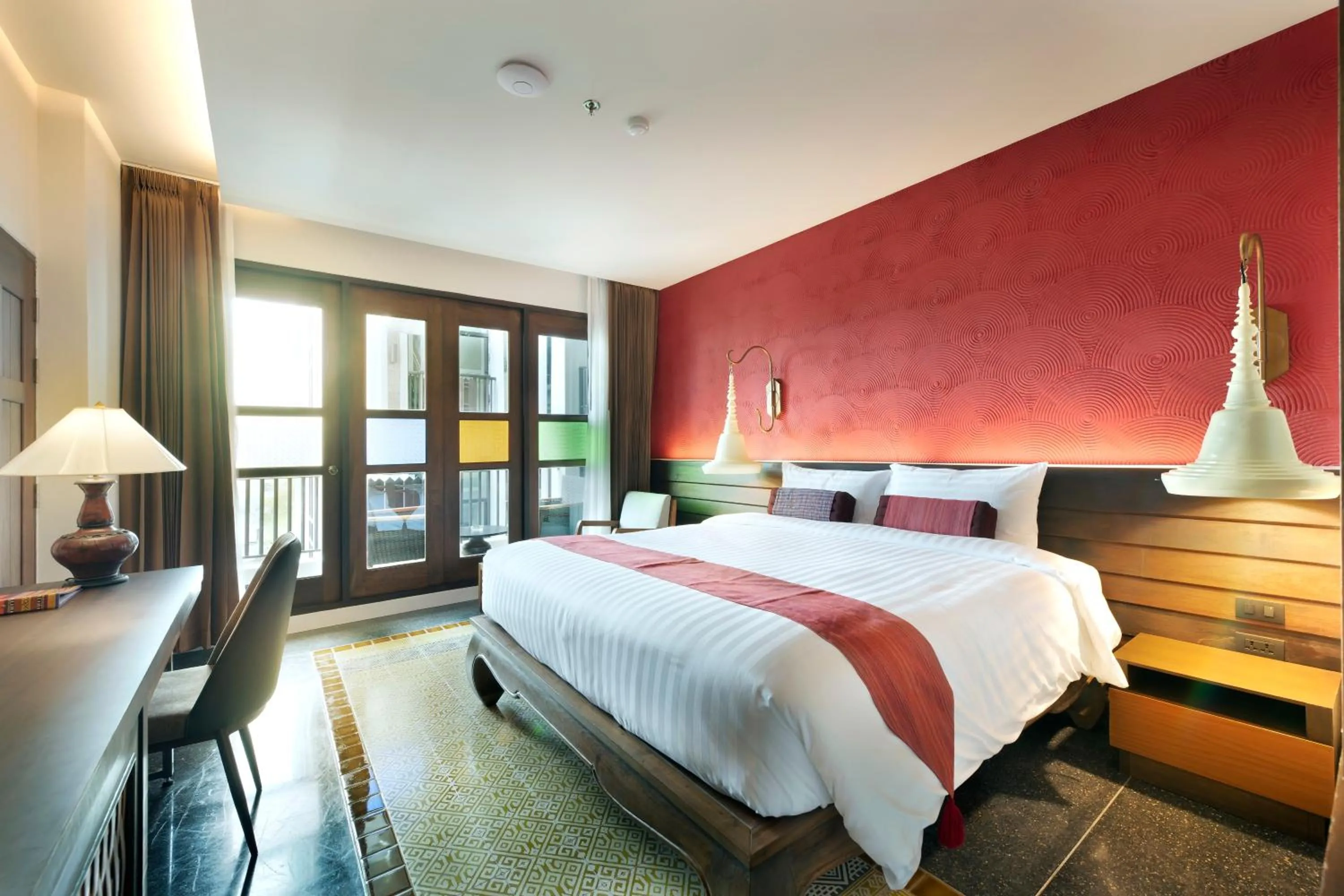 Delux King bed with Pool View in Monkham Village Hat Yai