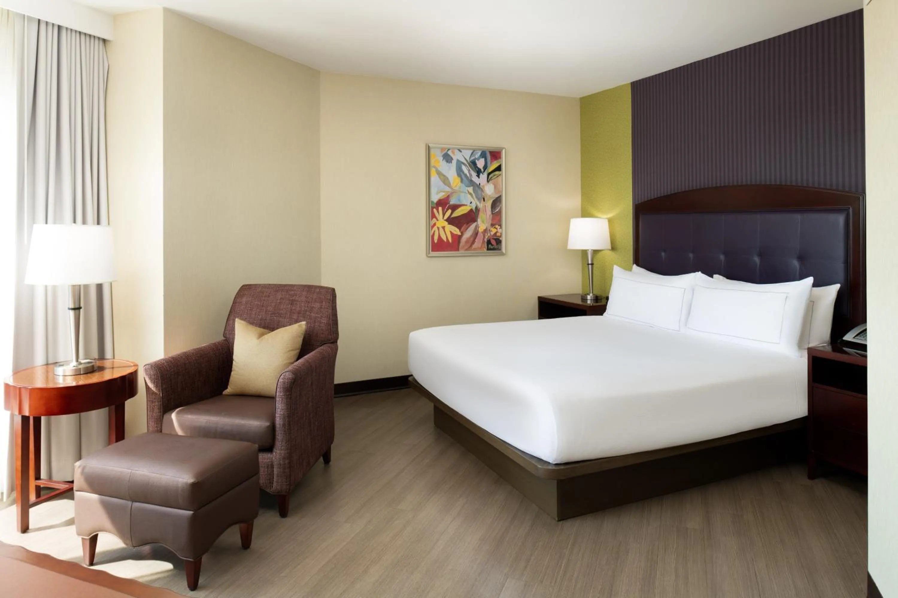 Junior King Suite with Seating Area in Hilton Charlotte Uptown