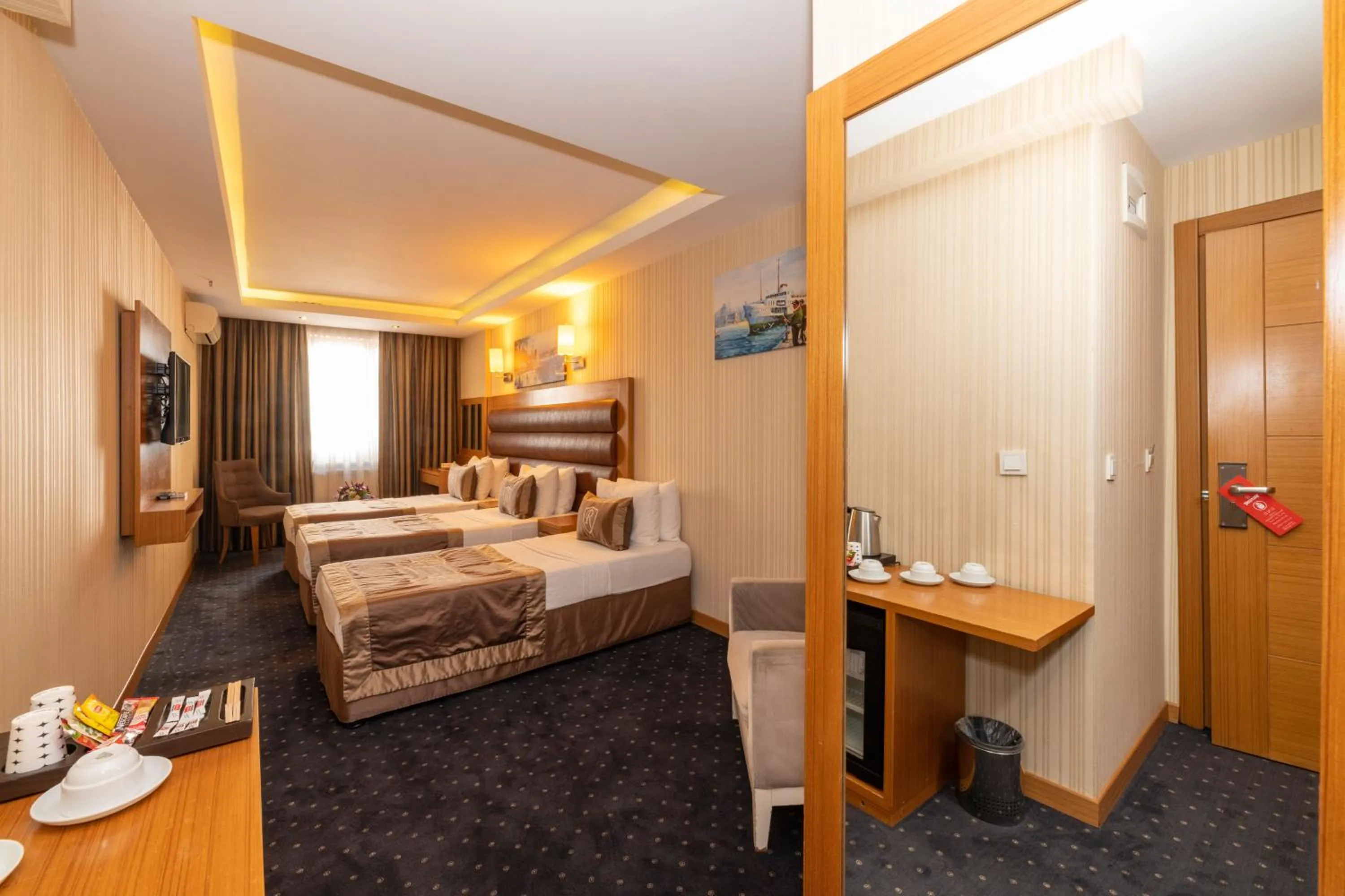 Standard Triple Room in Regno Hotel