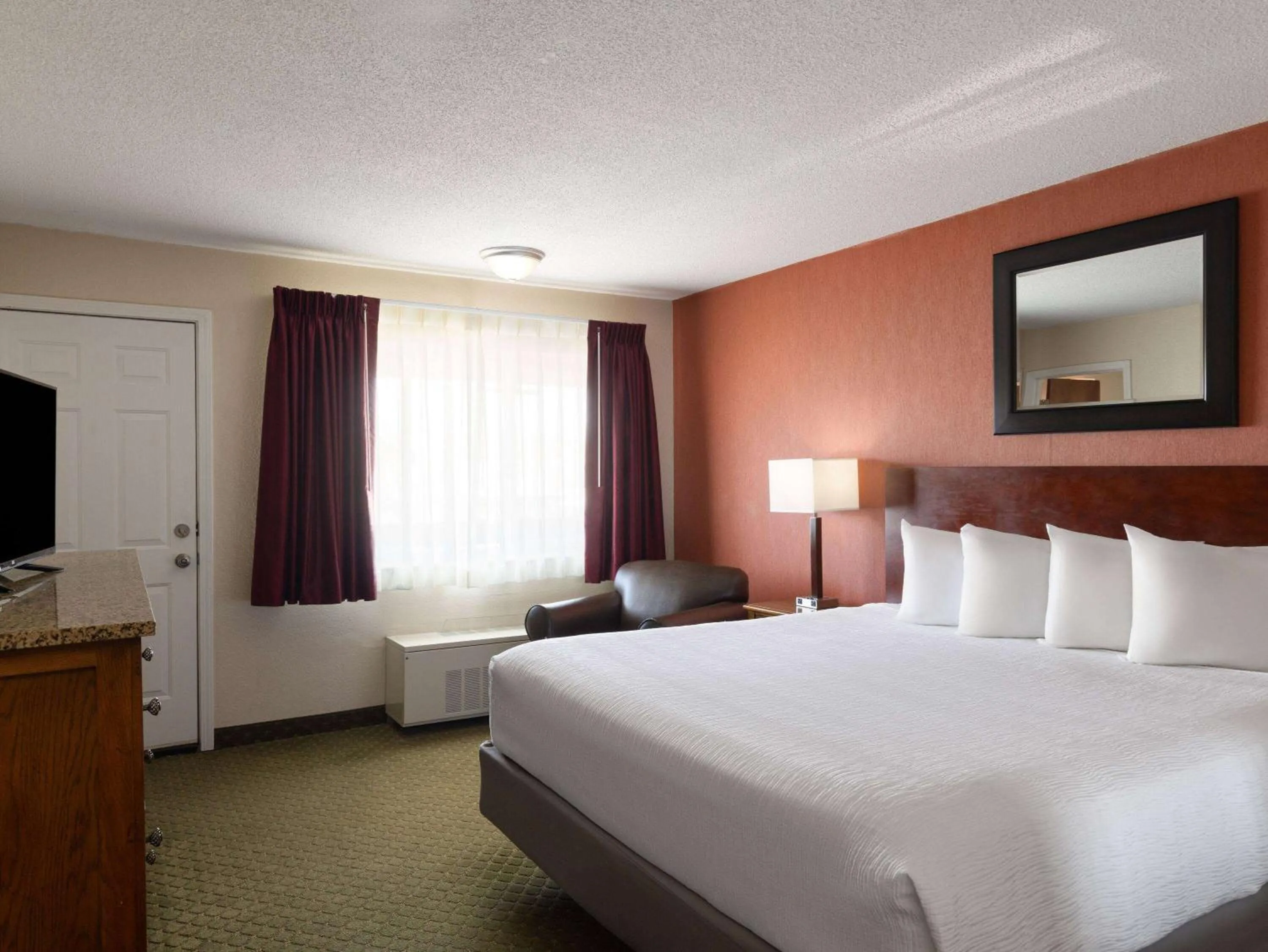 Standard King Room with One King Bed and Balcony - Non-Smoking in Ramada by Wyndham Elko Hotel at Stockmen's Casino