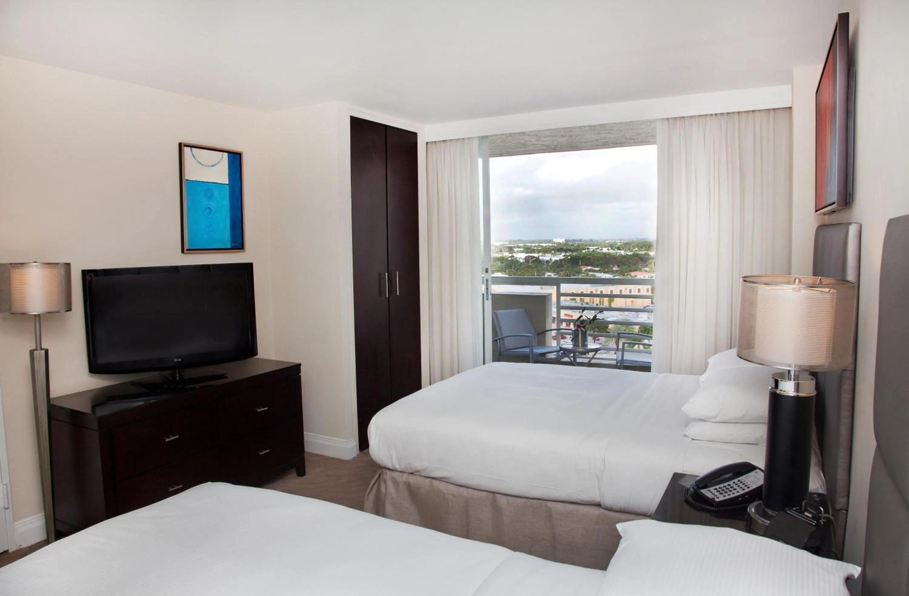 Queen Suite with Balcony and Pool View in GALLERY One - A DoubleTree Suites by Hilton Hotel