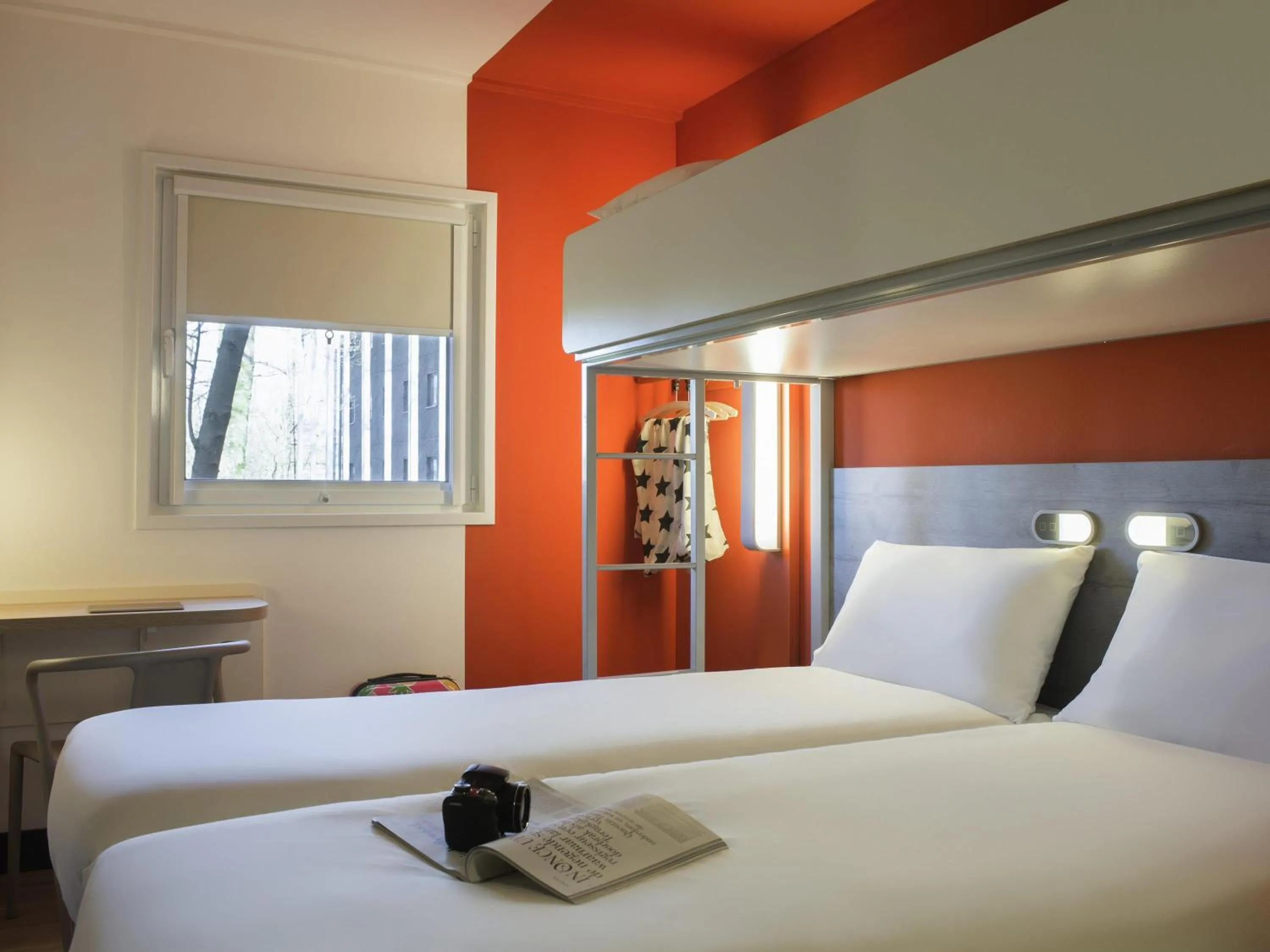 Standard Room with Two Single Beds and One Bunk Bed in ibis budget Amsterdam Airport