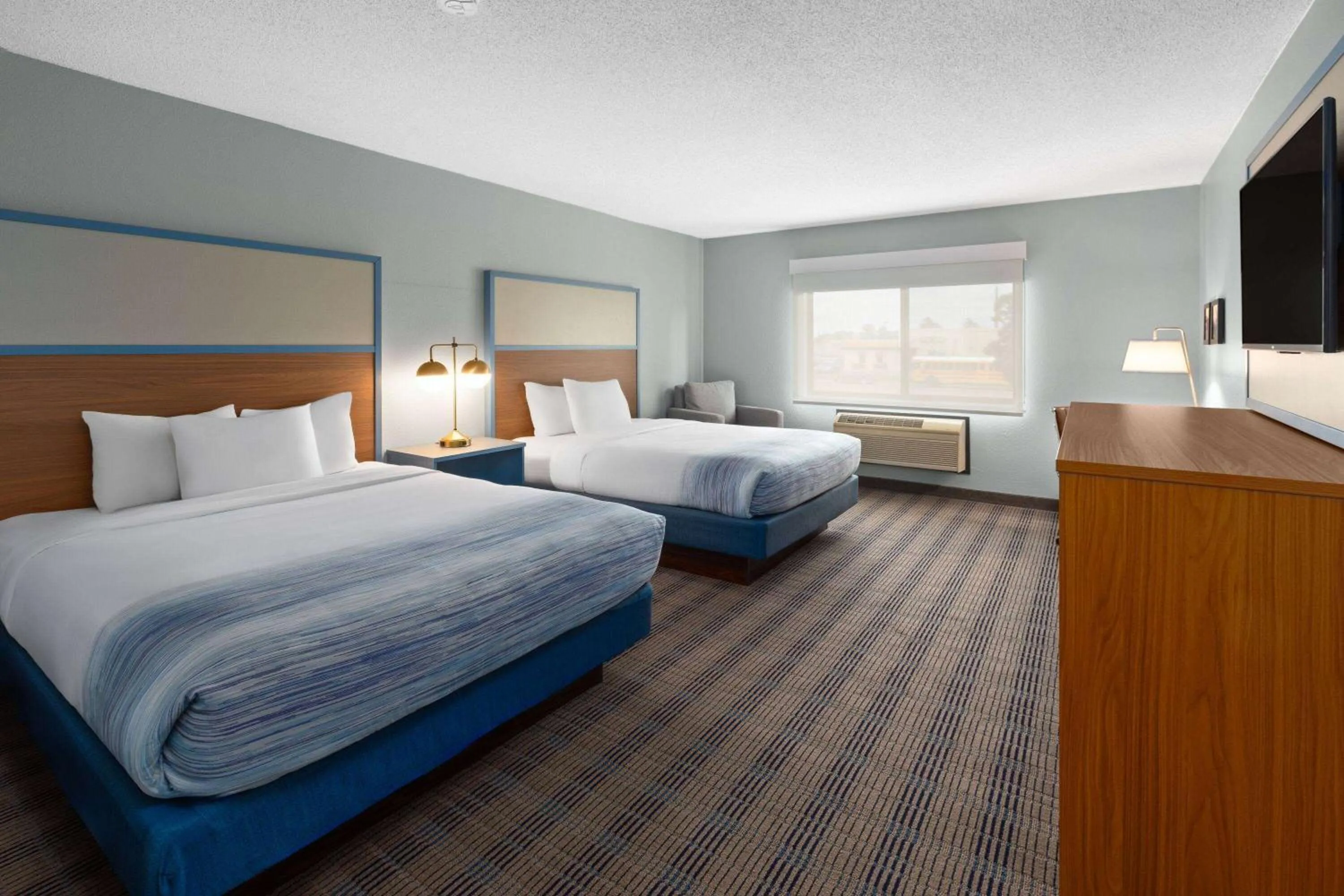 Deluxe Queen Room with Two Queen Beds - Second Floor/Non-Smoking in AmericInn by Wyndham North Branch