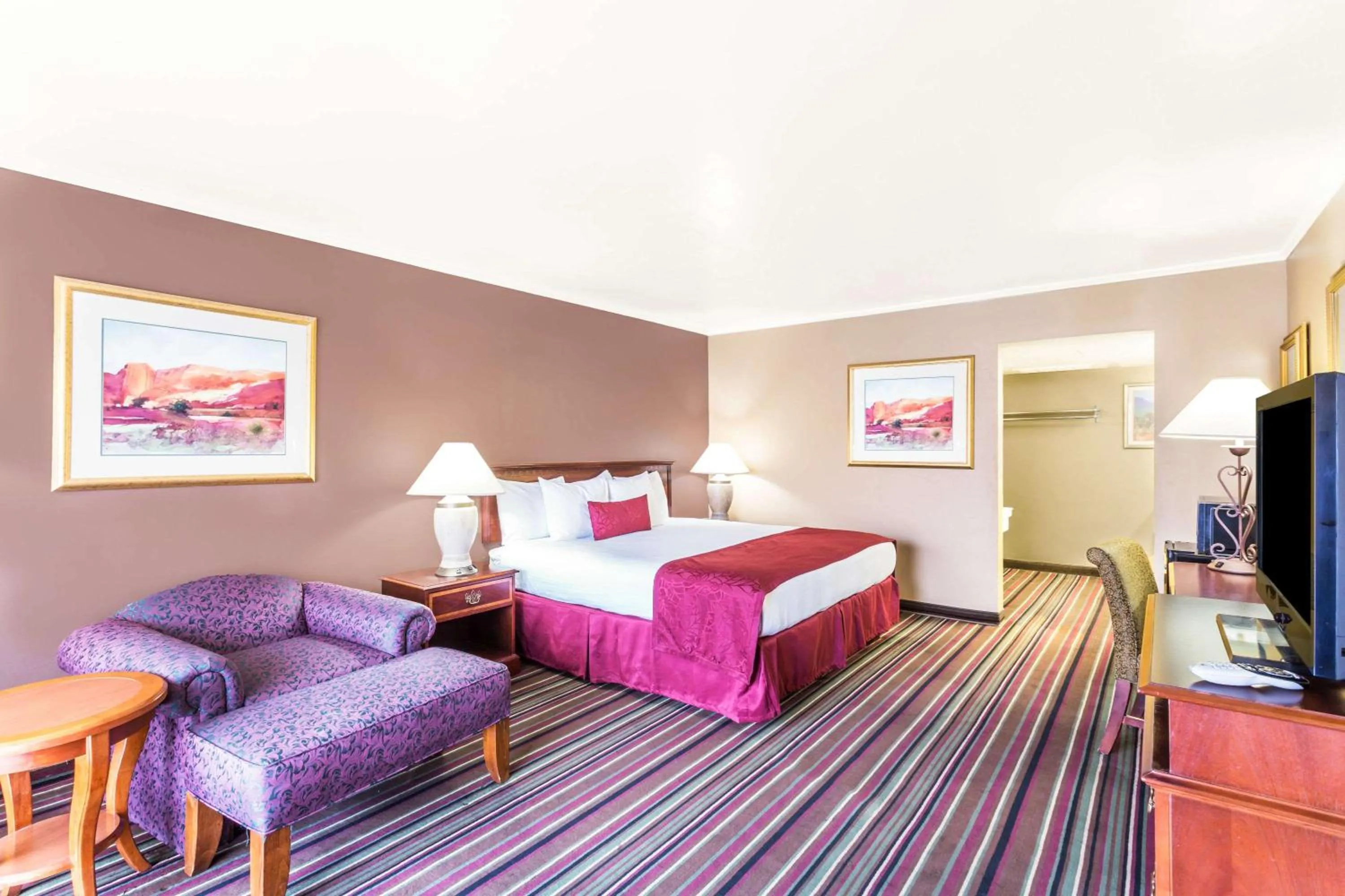 Deluxe King Studio Suite - Non-Smoking in Days Inn & Suites by Wyndham Logan