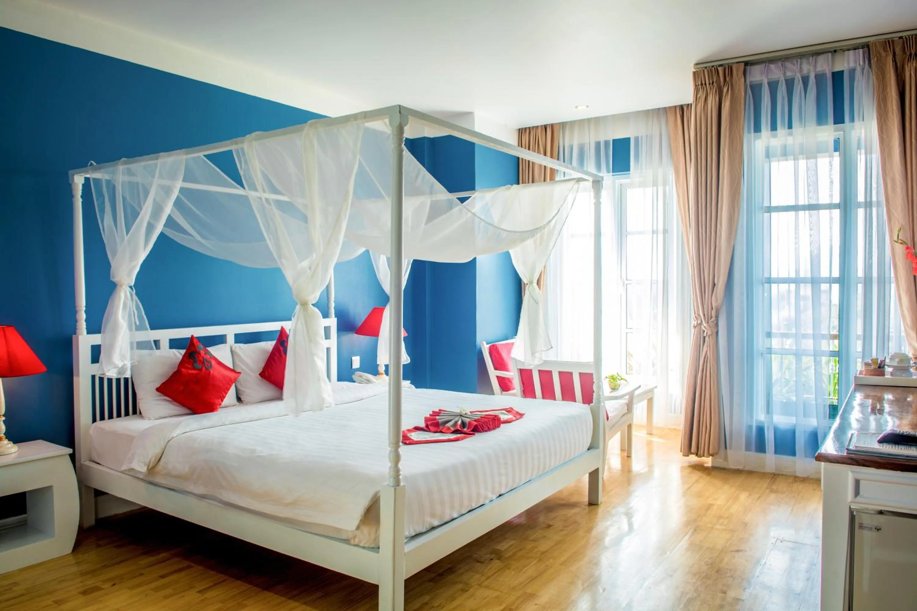 Deluxe Room in The Frangipani Royal Palace Hotel