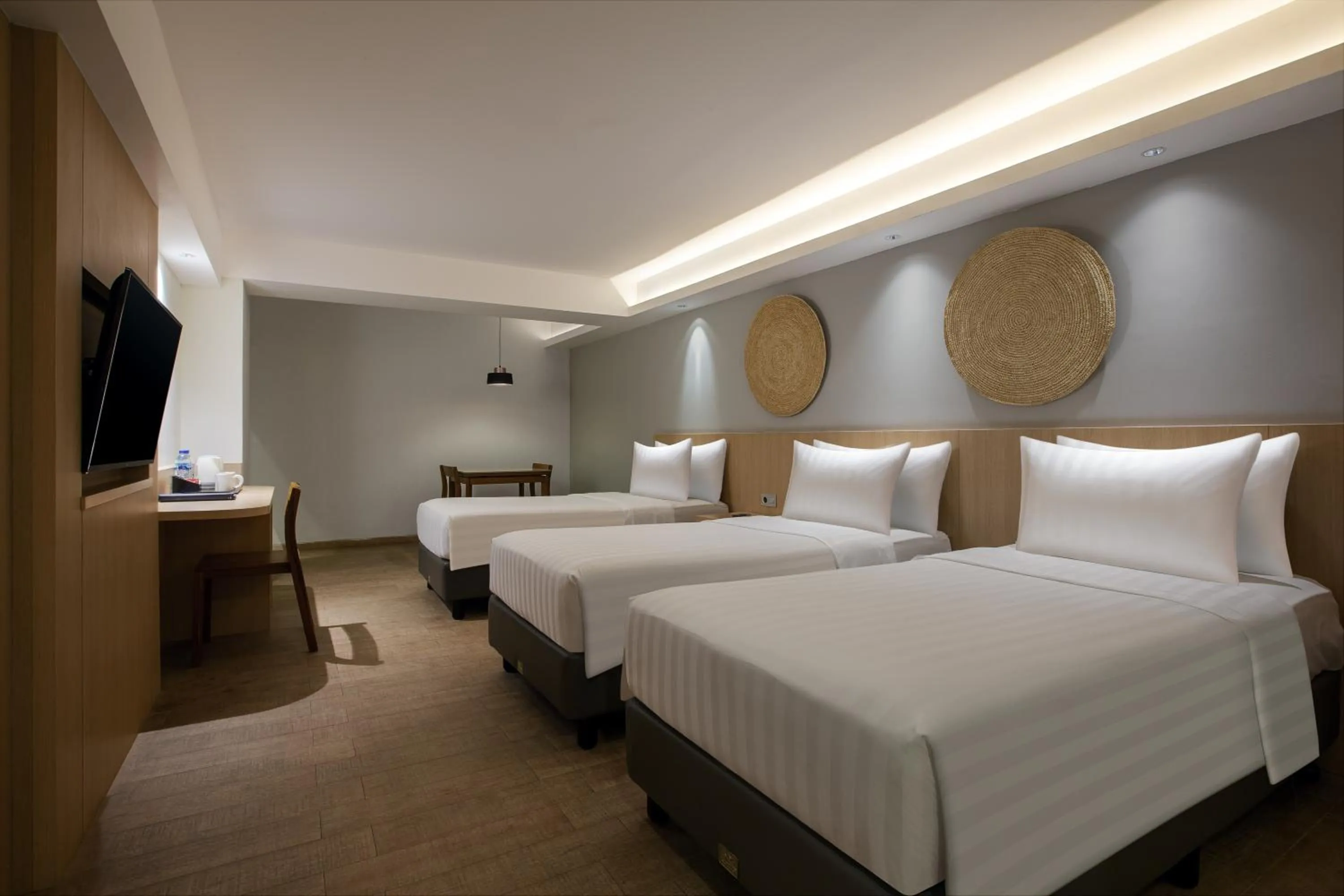 Family triple room in Aveta Hotel Malioboro