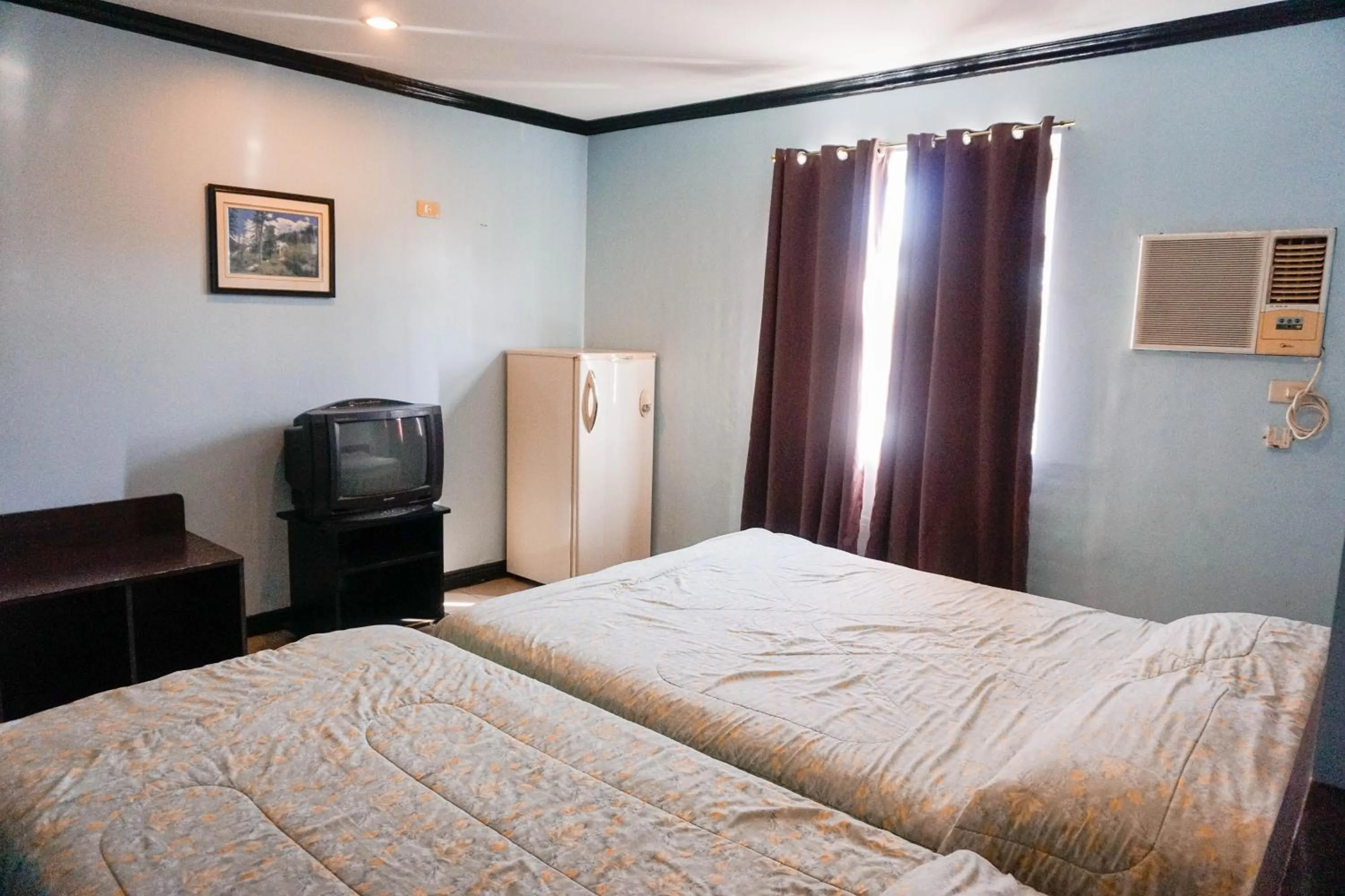 Superior Triple Room in Crowne Garden Hotel