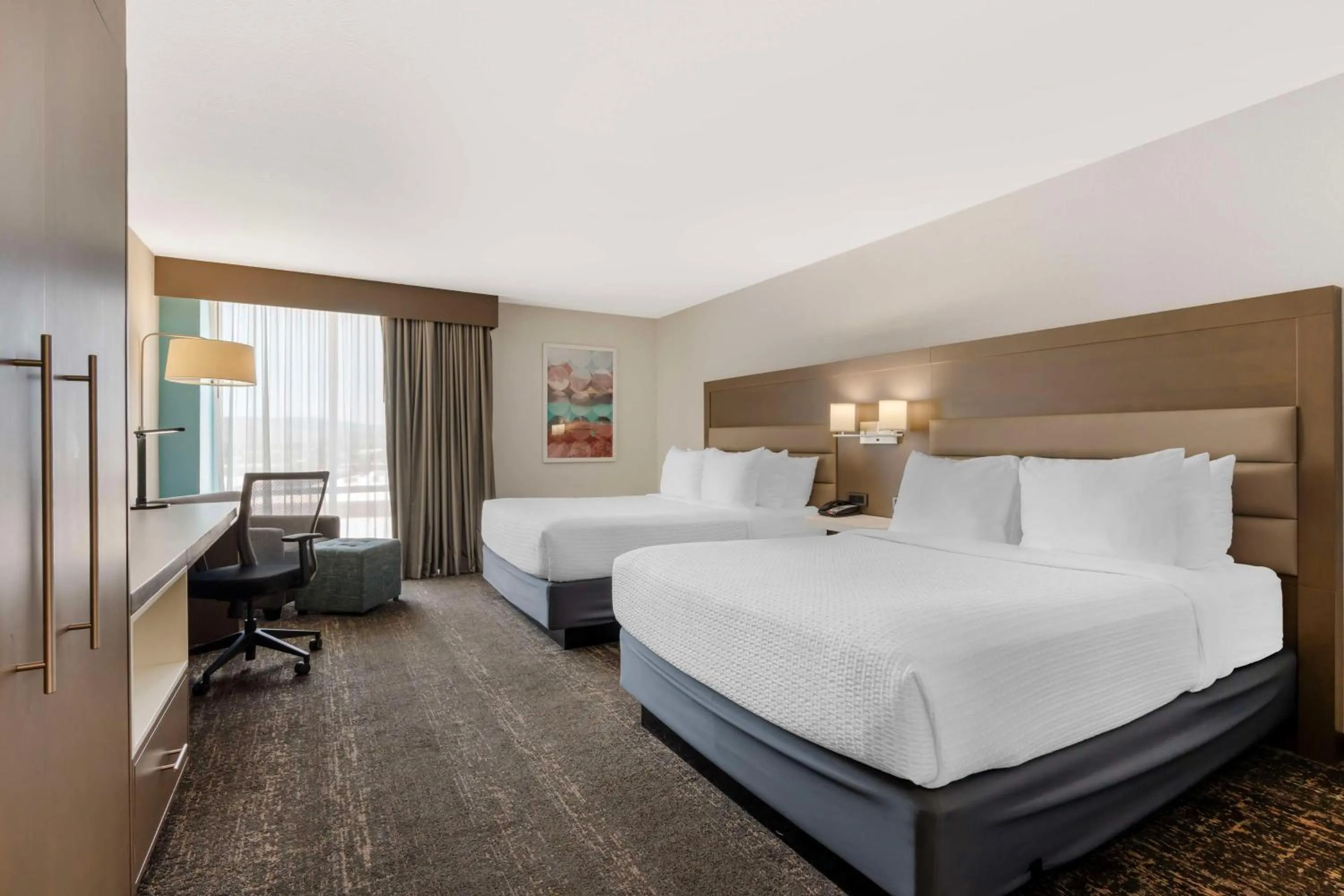 Queen Room with Two Queen Beds and Mobility Accessible Roll-In Shower in Best Western Plus Sparks-Reno Hotel