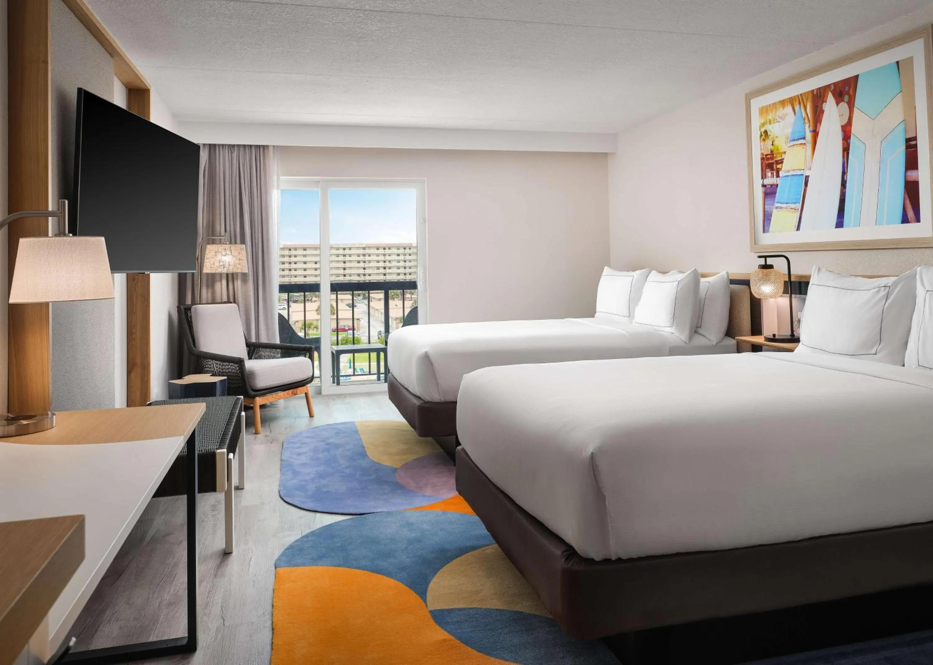 Premium Queen Room with Two Queen Beds and Partial Ocean View in Hilton Garden Inn Cocoa Beach-Oceanfront, FL