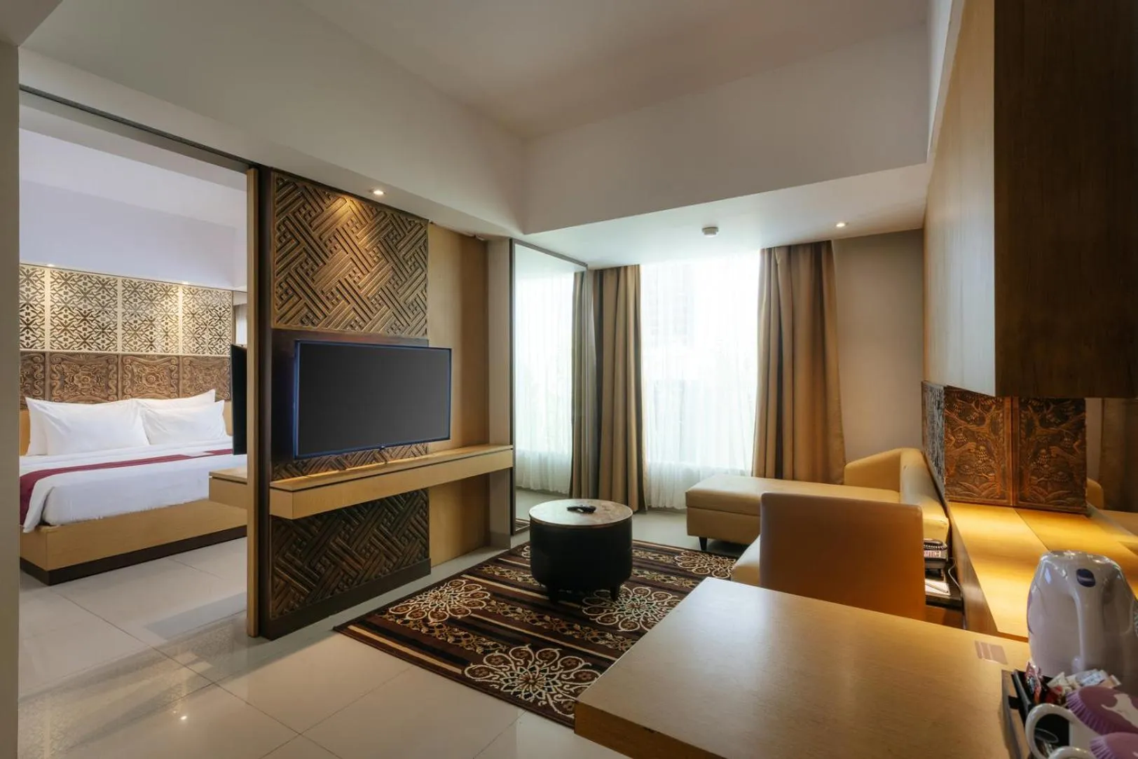 Horison Suite with Free Balinese Culture Experience and 1 Time Mini Bar in Horison Ultima Seminyak Bali - CHSE Certified