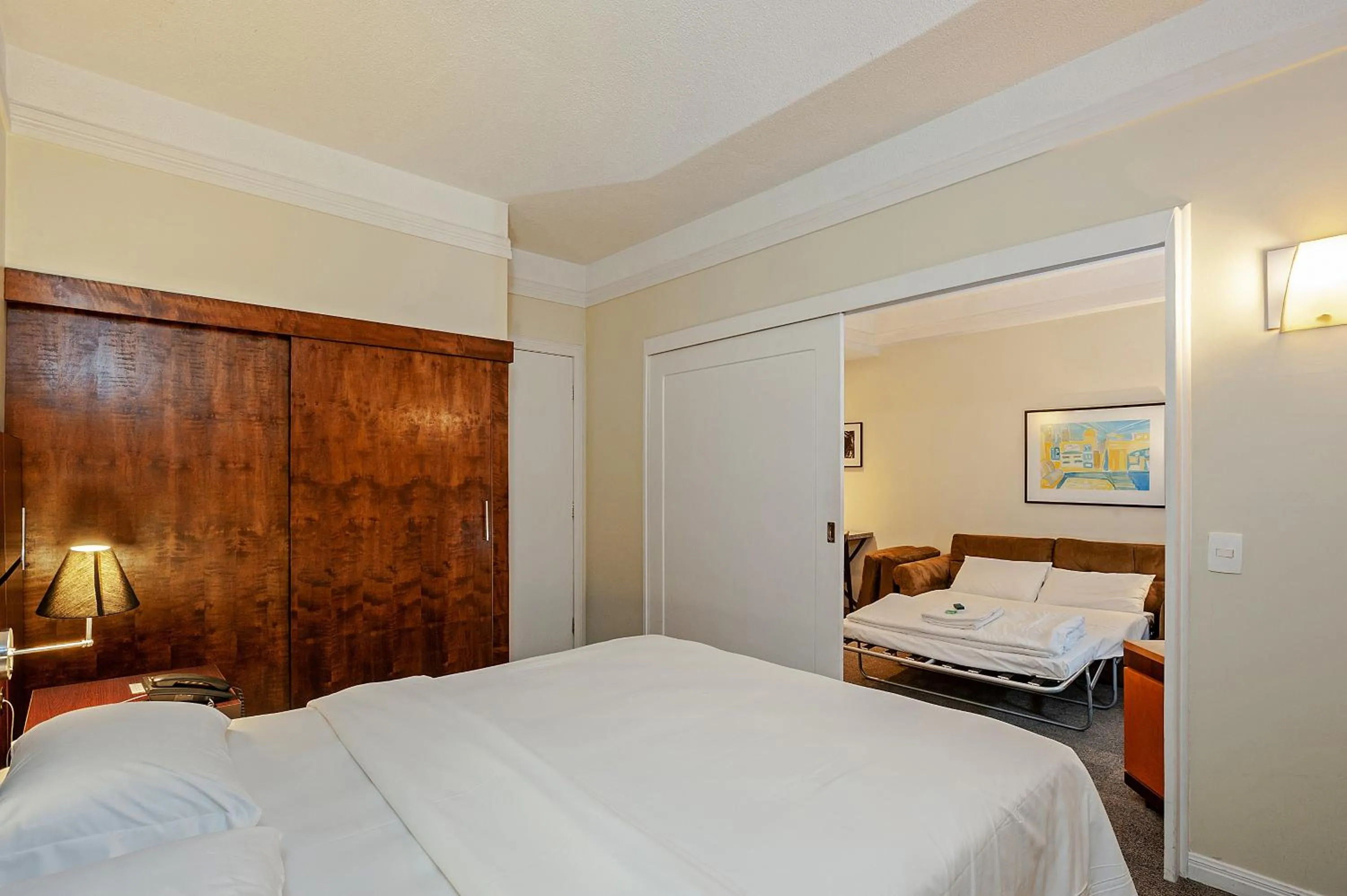 SUÍTE CASAL COM SOFÁ CAMA - single occupancy in Slaviero Curitiba Shopping