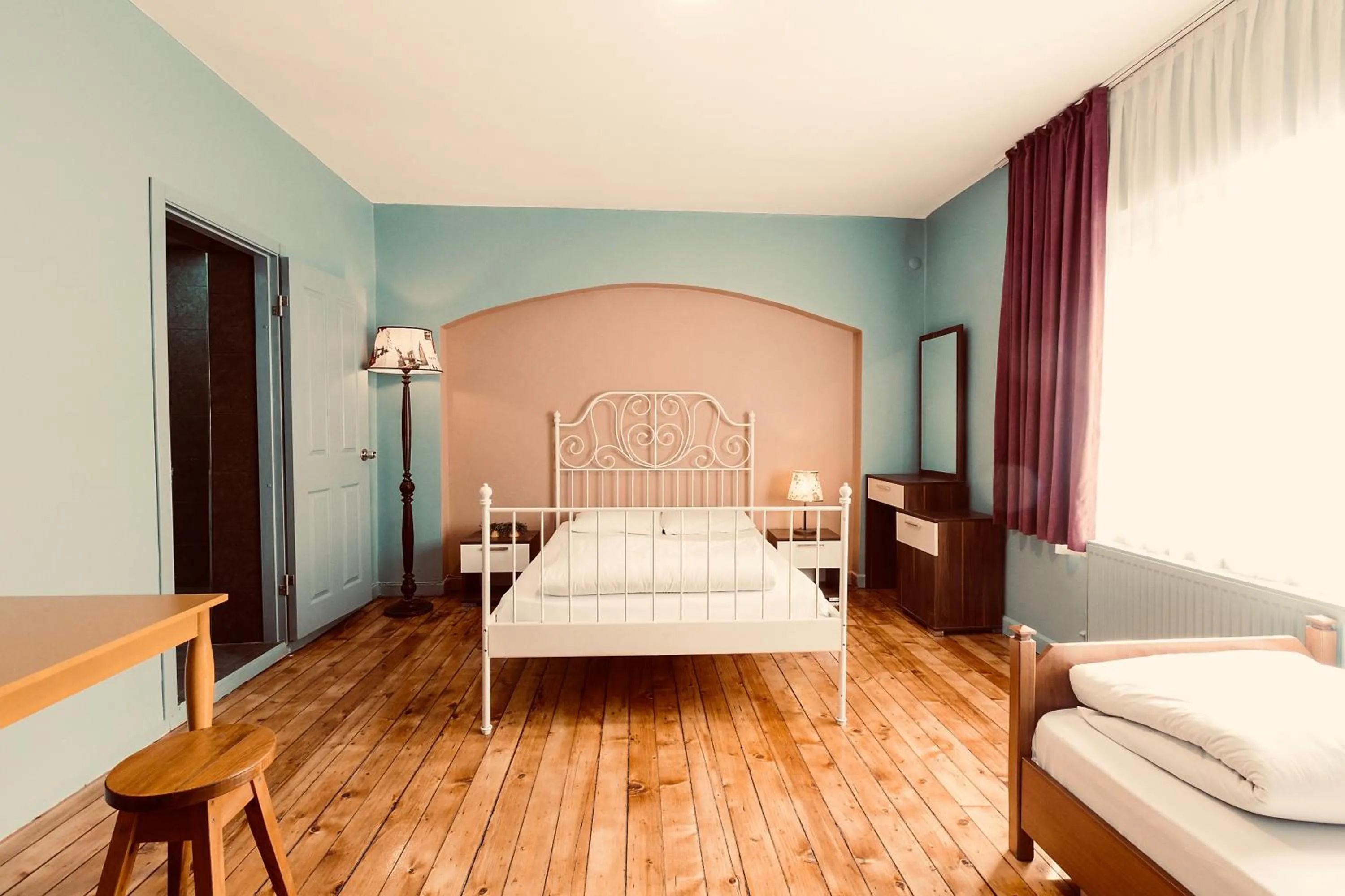 Deluxe Triple Room with Private Bathroom in Cheers Midtown Hostel