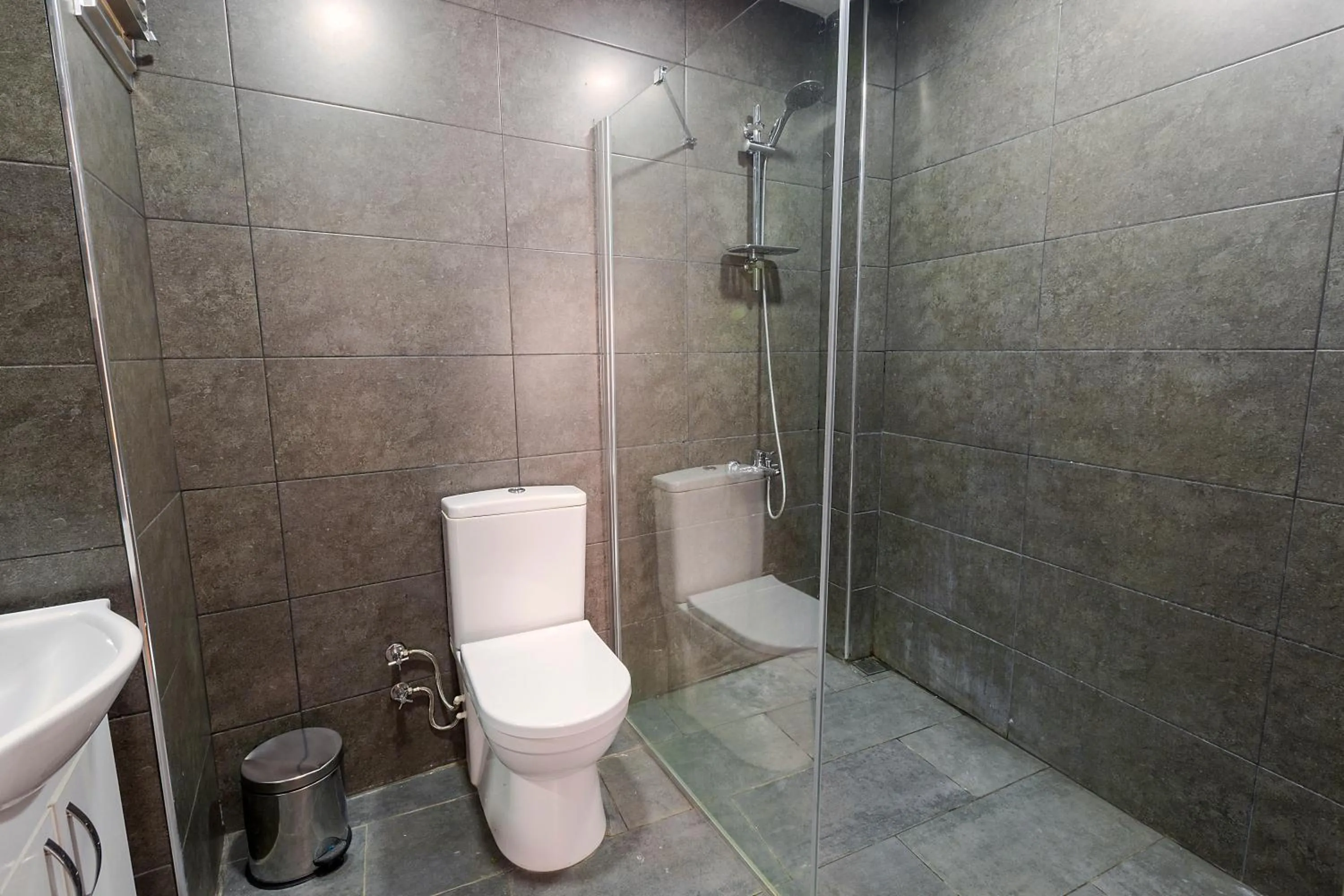 Quadruple Room with Private Bathroom in Cheers Midtown Hostel