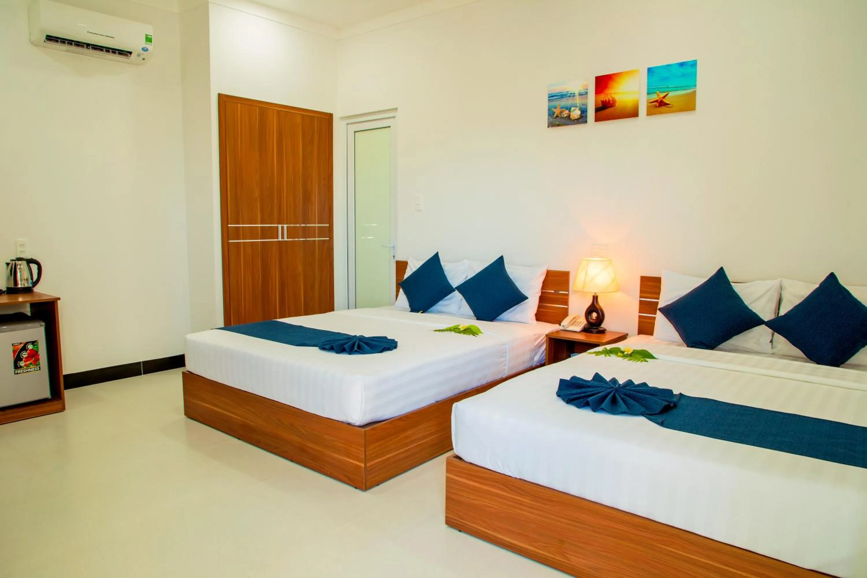 Quadruple Room with Balcony in PHAM GIA HOTEL Mui Ne