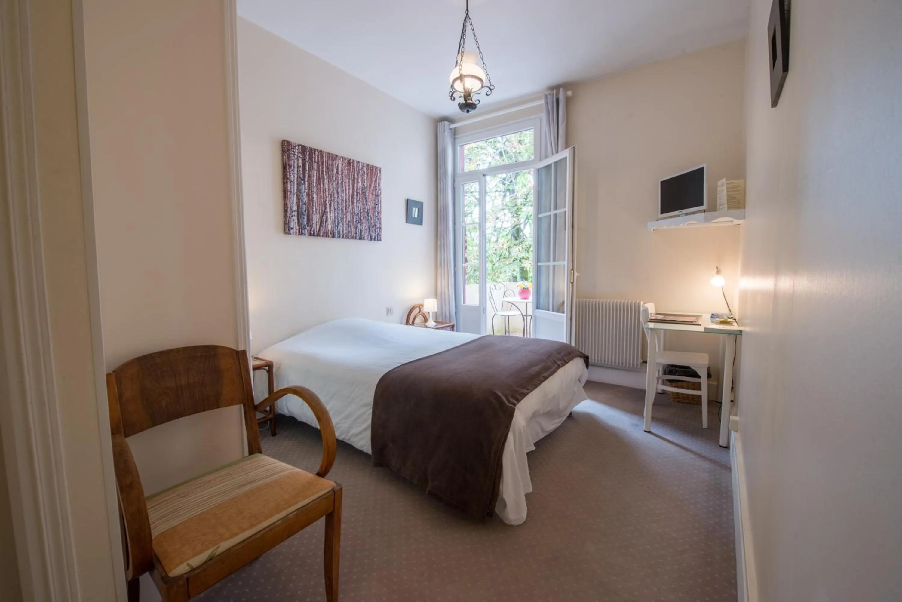 Double or Twin Room with Park View in Logis Hotels - Au Colombier du Touron