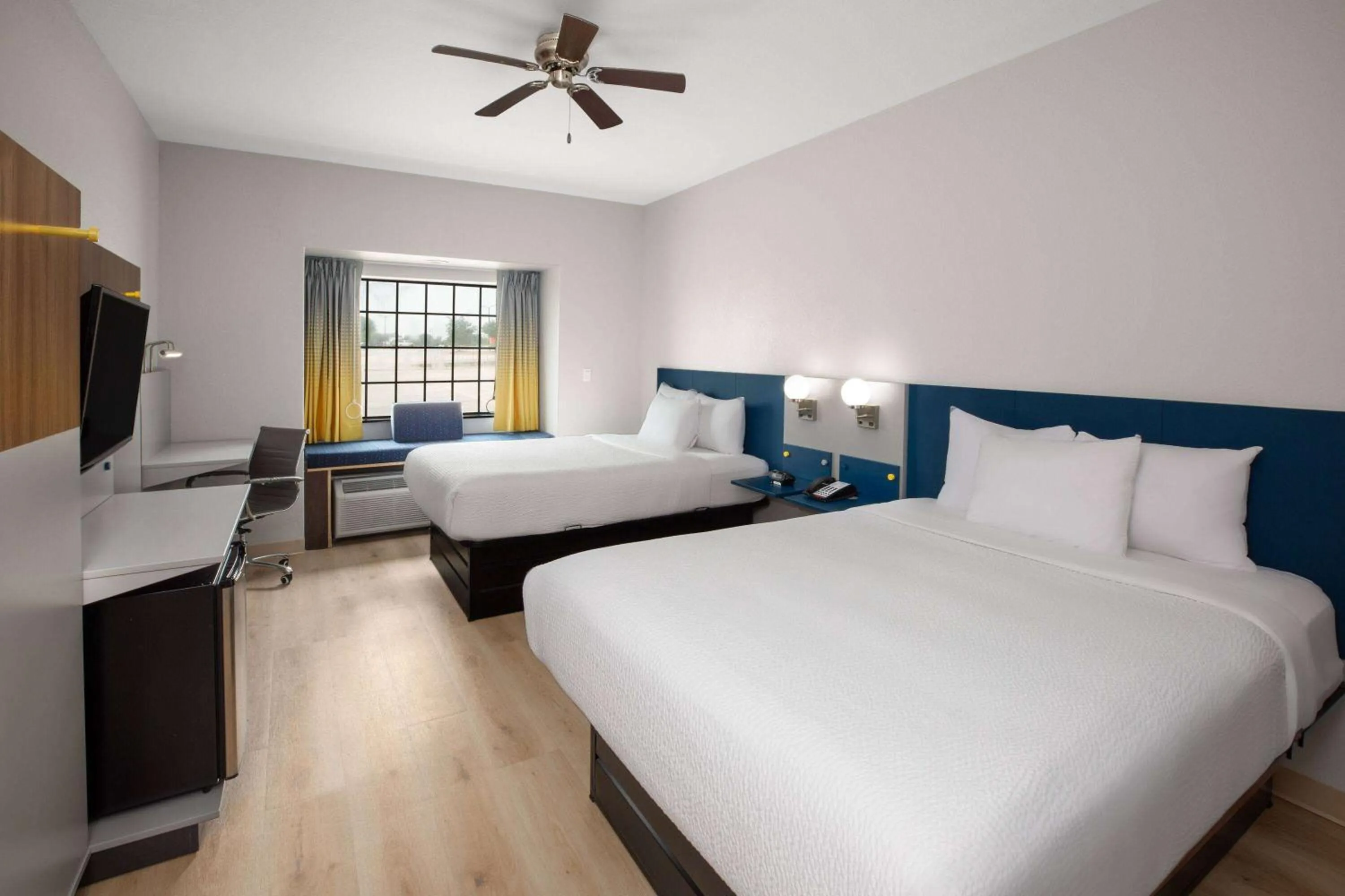 Queen Room with Two Queen Beds - Disability Access in Microtel Inn & Suites by Wyndham Buda Austin South