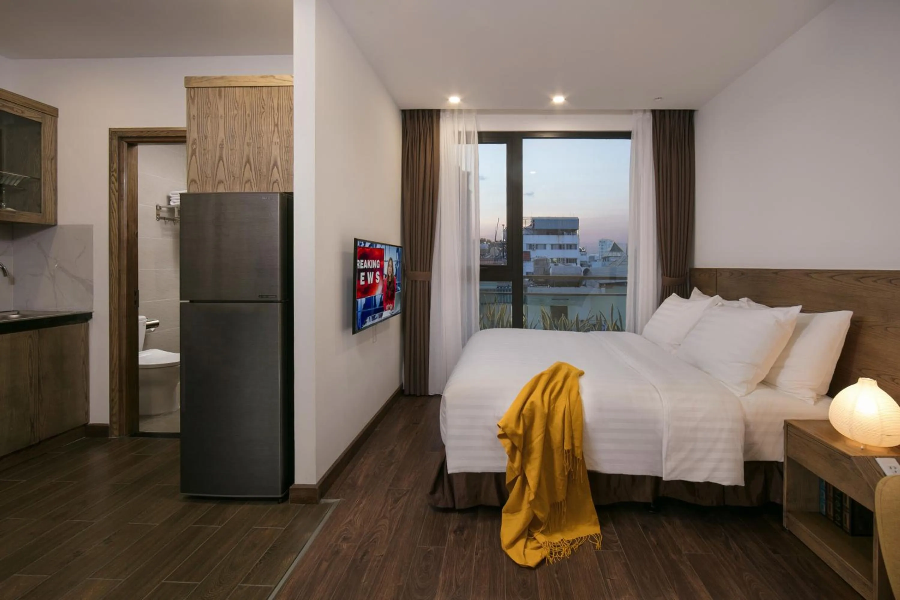 Executive Deluxe Studio with Bathtub and Kitchen in The Bloom Pham Viet Chanh - Modern Living Space in Saigon - A Top Choice for Western Travelers