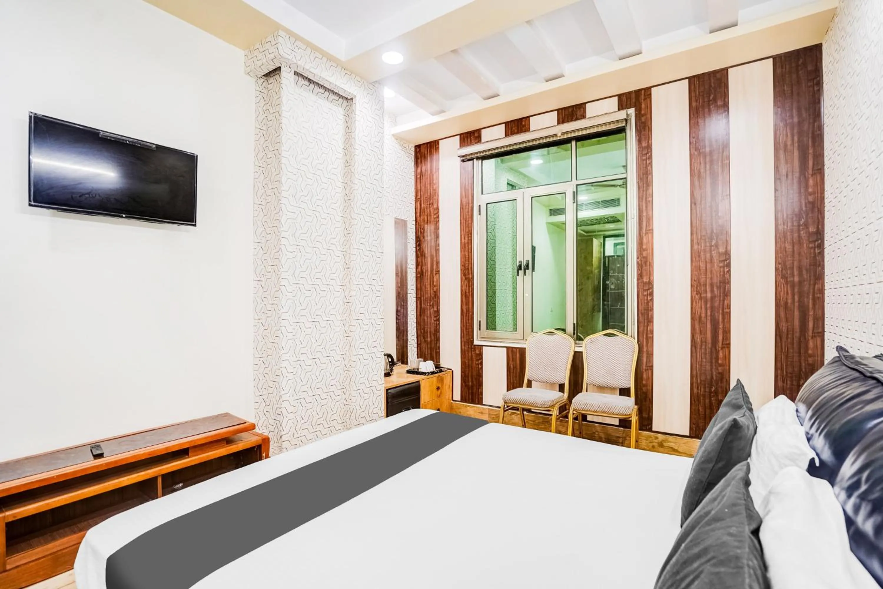 Classic Triple Room - single occupancy in Super Townhouse Keshavpuram