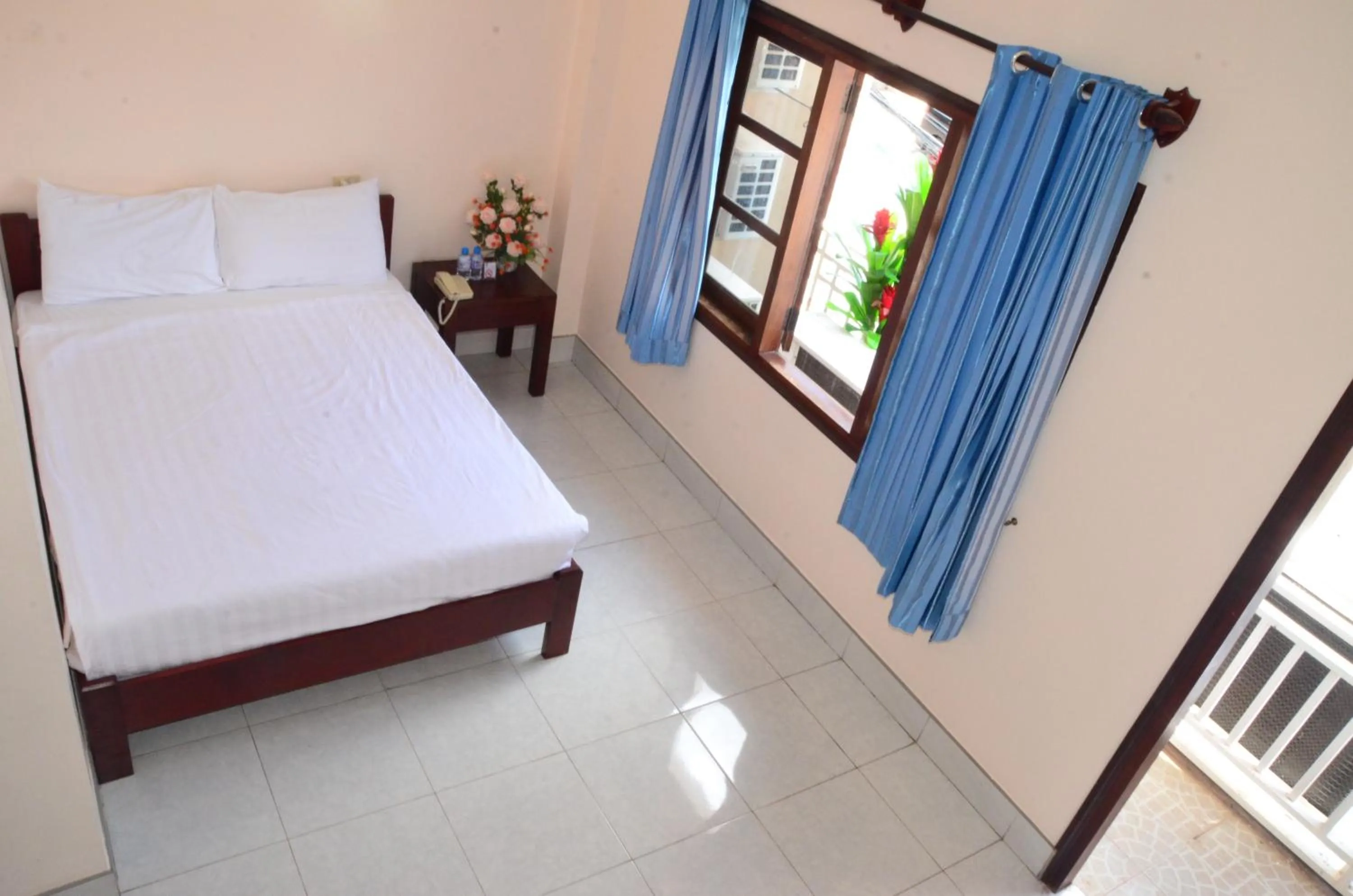 Queen Room with Balcony in Hoang Kim Hotel