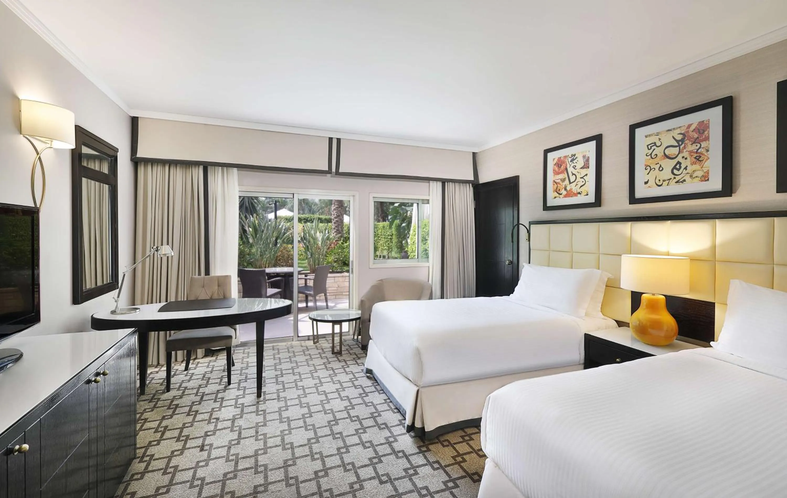 Twin Patio Room with Terrace Pool View in Hilton Cairo Heliopolis Hotel
