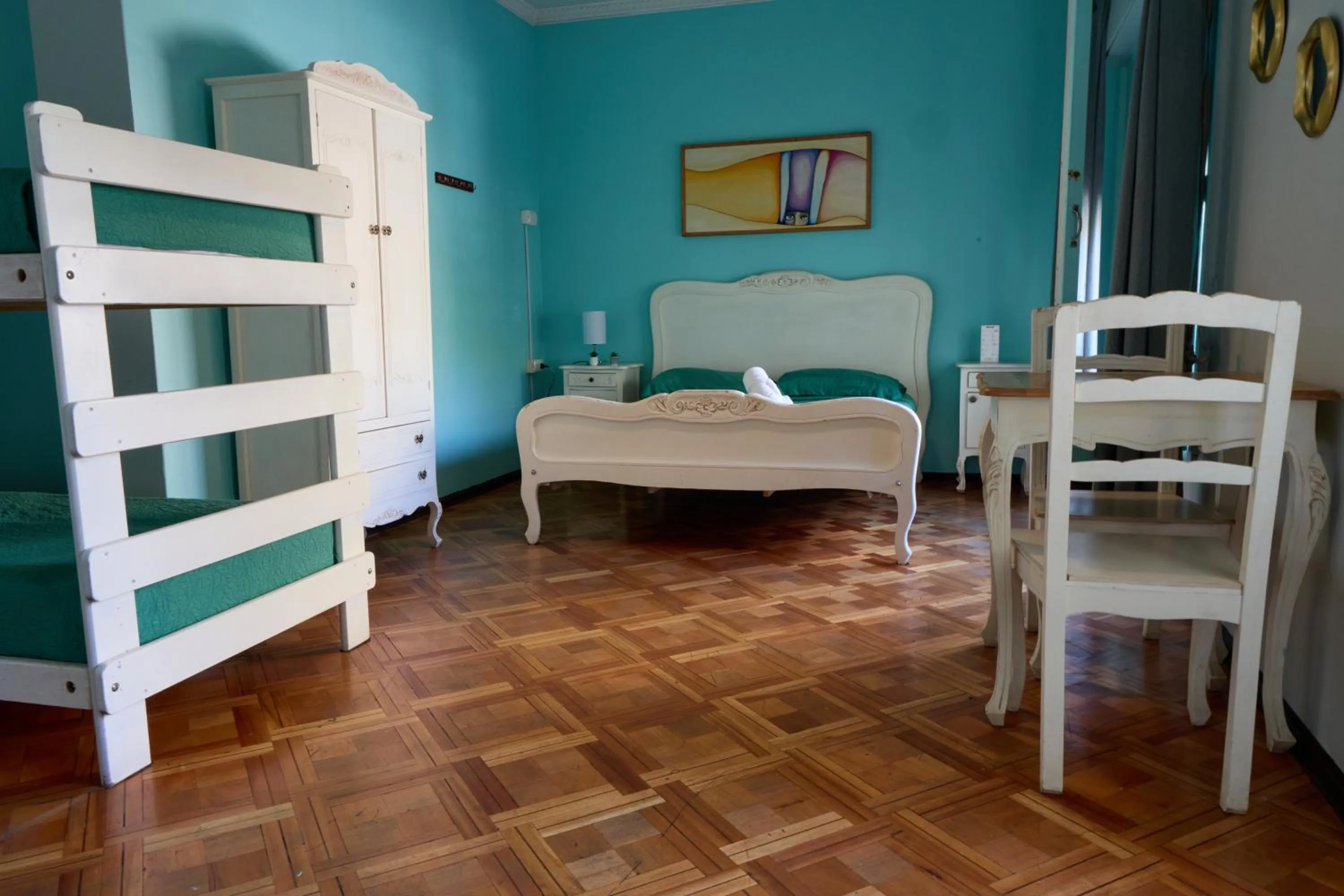 Quadruple Room with Private Bathroom in Hostal Providencia