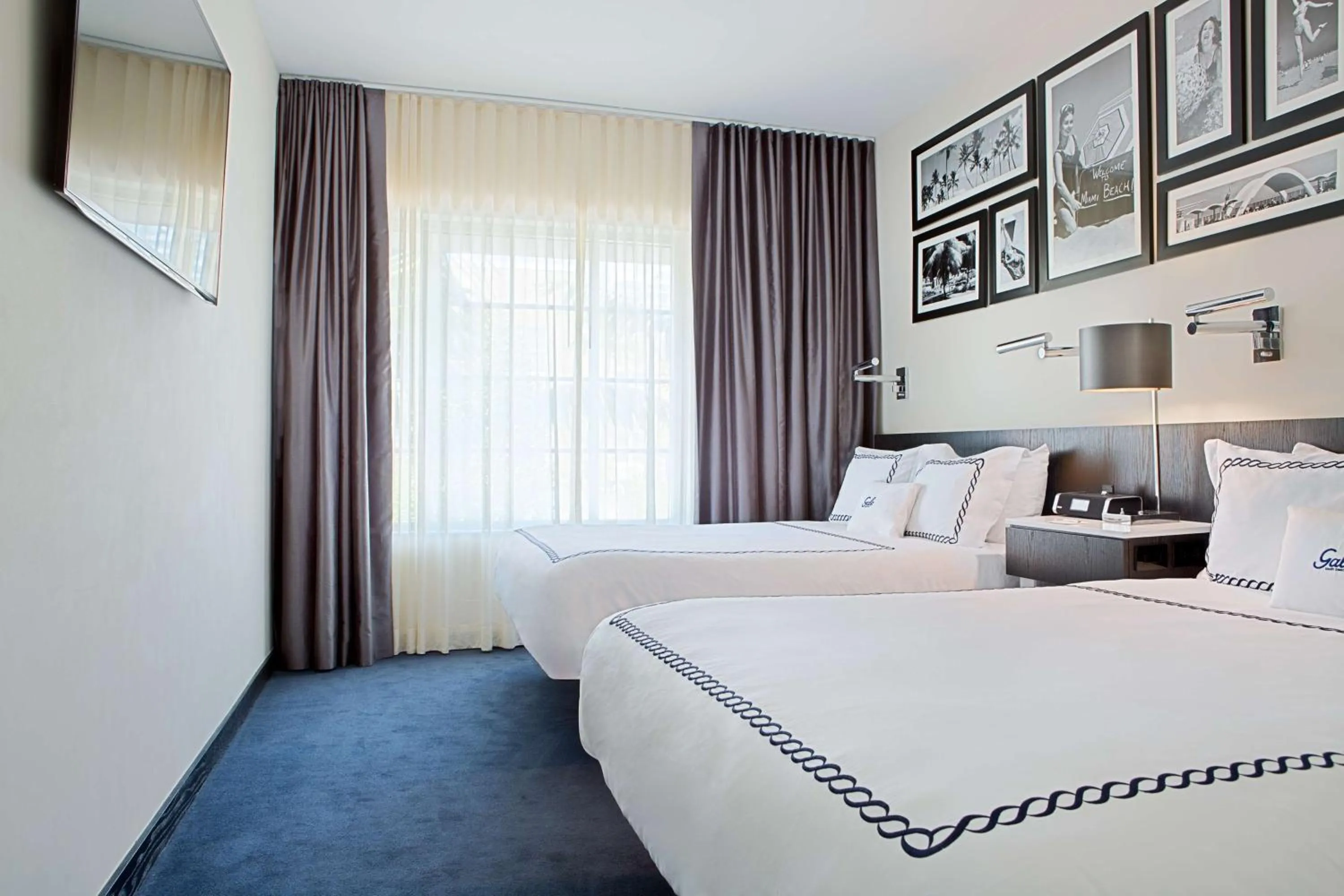 Signature Queen Room with Two Queen Beds in Gale South Beach, Curio Collection By Hilton