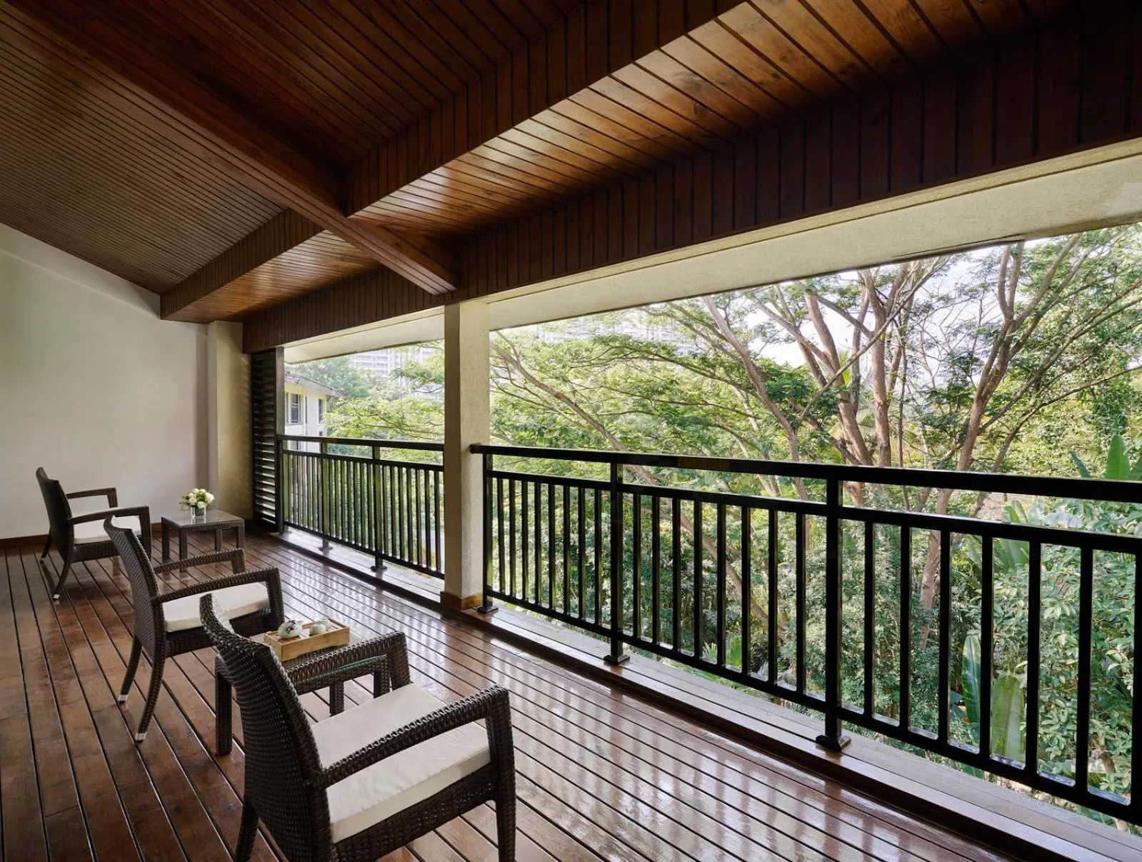 One-Bedroom Suite Lounge Access Dining Meeting Area in InterContinental Xishuangbanna Resort by IHG
