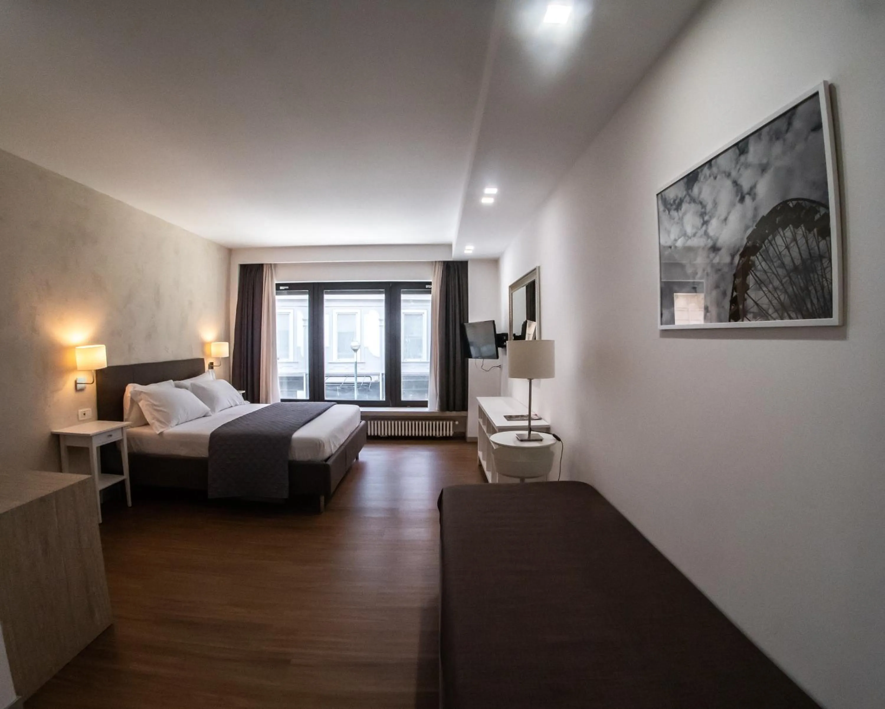 Superior Triple Room in Prestige Rooms Chiaia Hotel