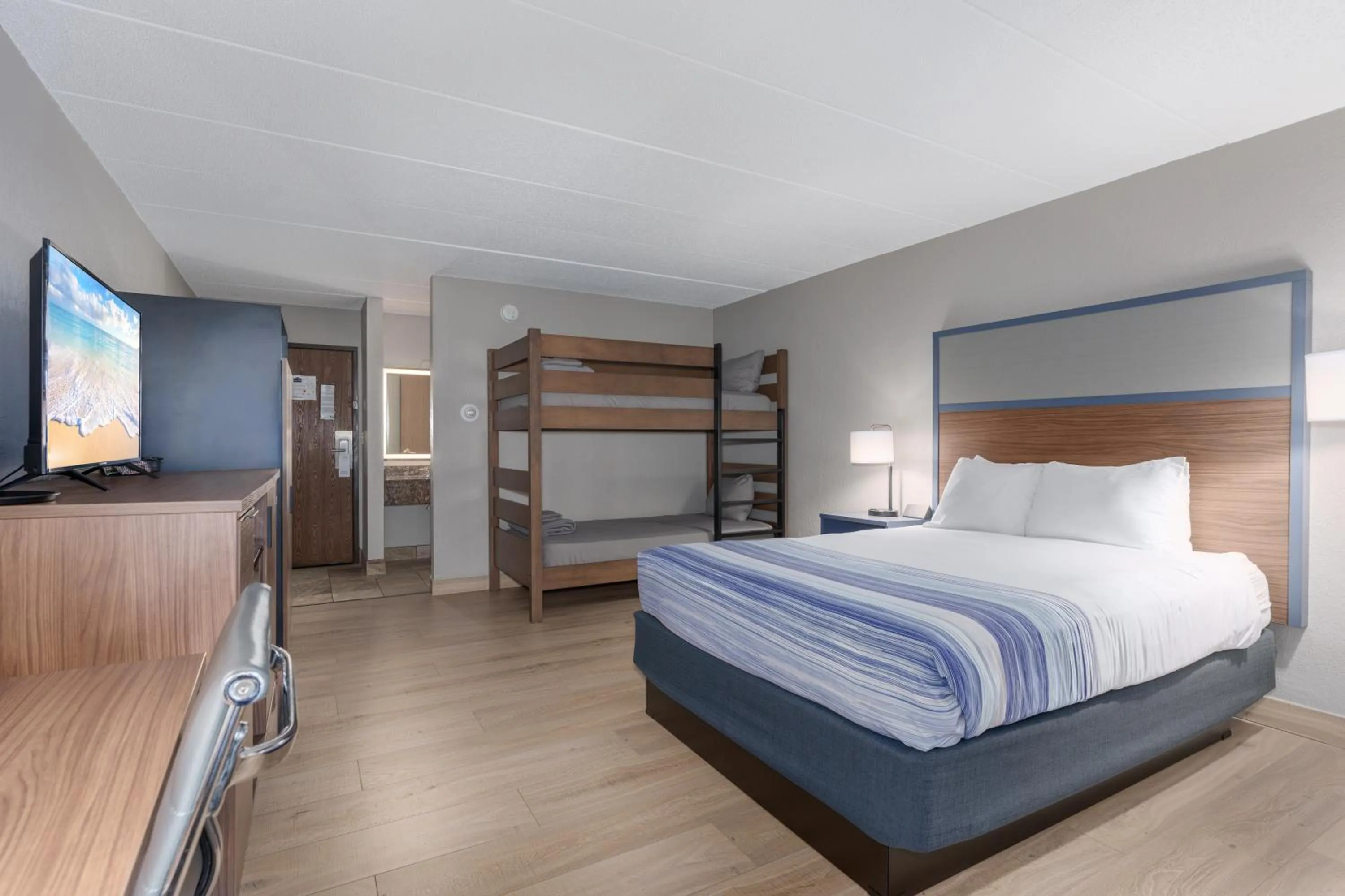 Double Room with One Queen Bed, Bunk Bed and Pool View - Non-Smoking in AmericInn by Wyndham New Richmond