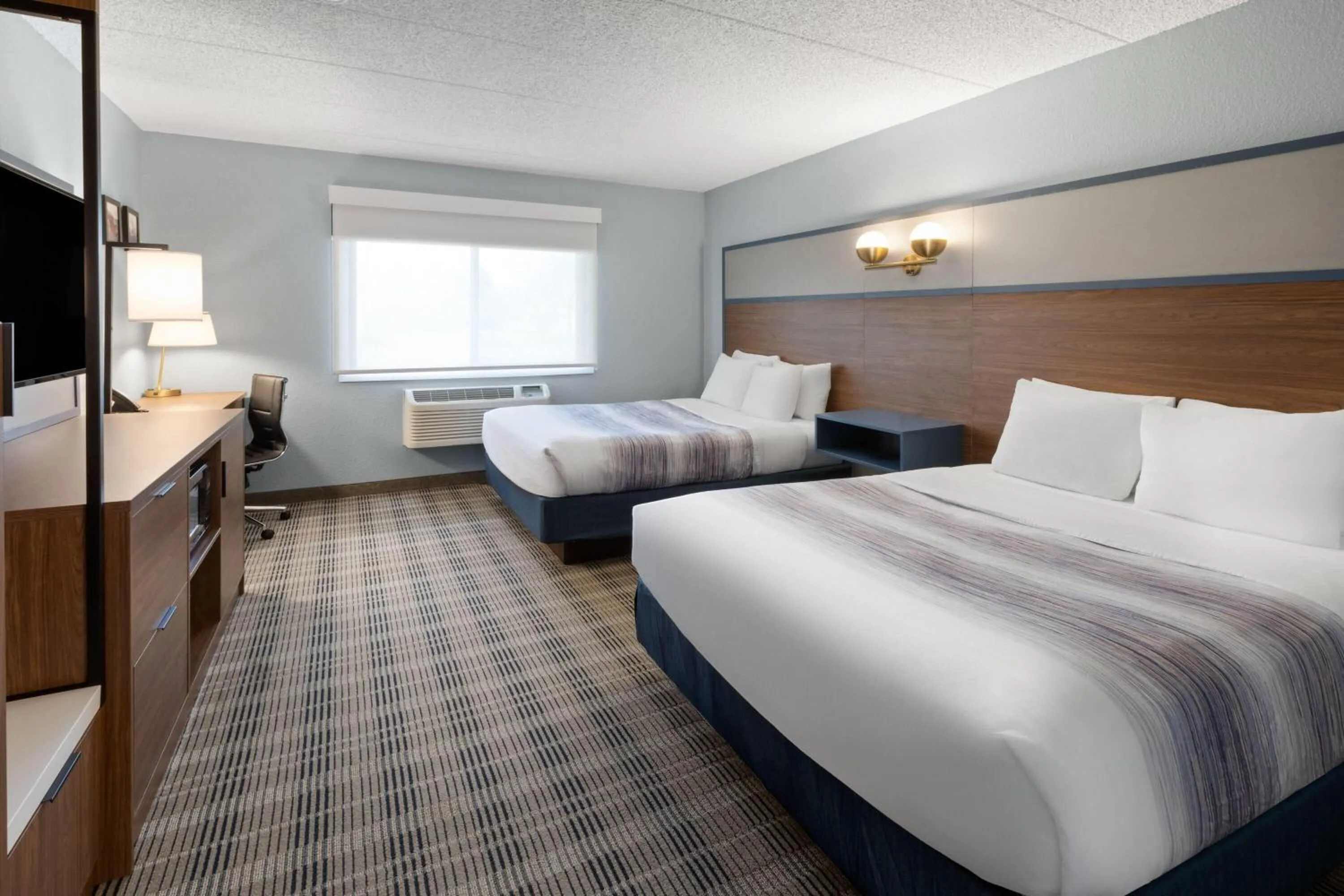 Connecting Room with Two Queen Beds - Non-Smoking in AmericInn by Wyndham Chippewa Falls