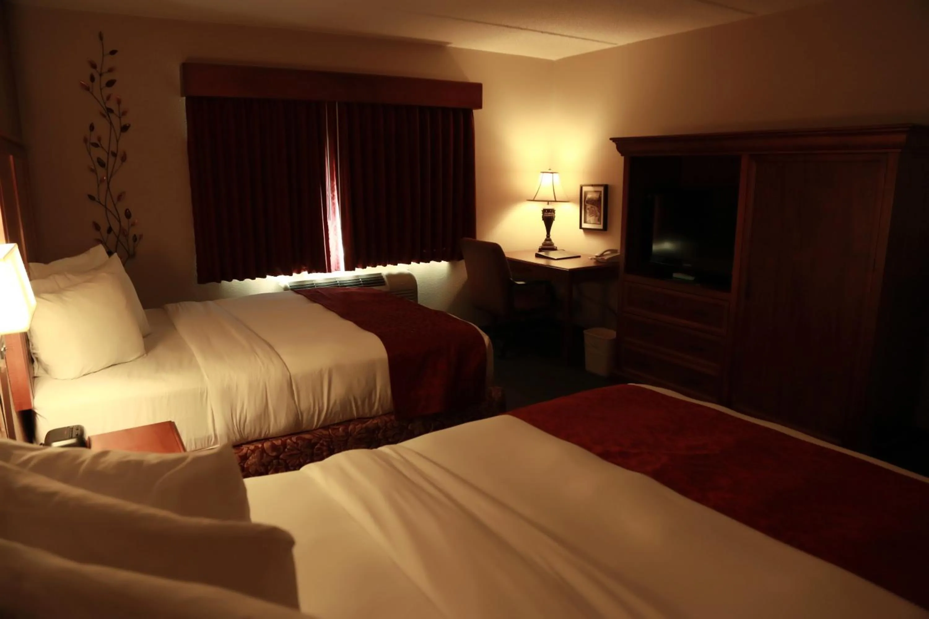 Queen Room with Two Queen Beds - Non-Smoking in AmericInn by Wyndham McAlester