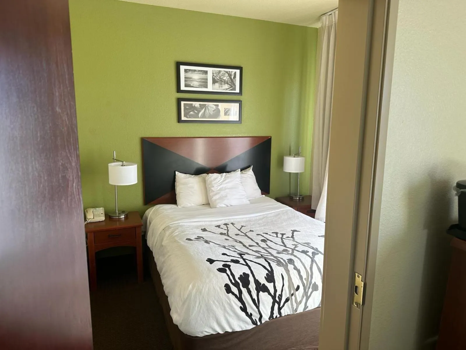 Queen Room with Three Queen Beds in Sleep Inn & Suites at Six Flags