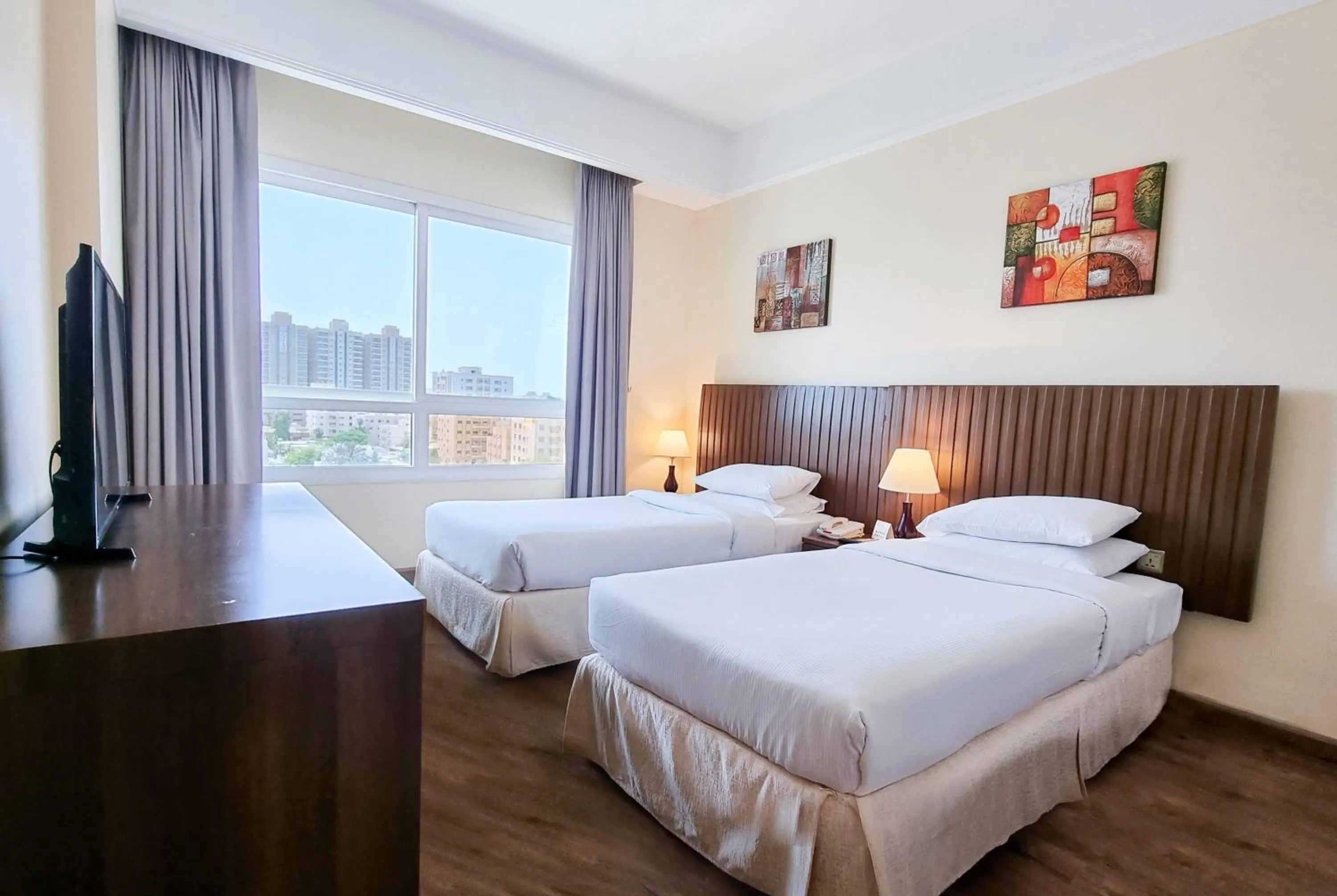Standard Twin Room with City View - Non Smoking in Ramada by Wyndham Beach Hotel Ajman