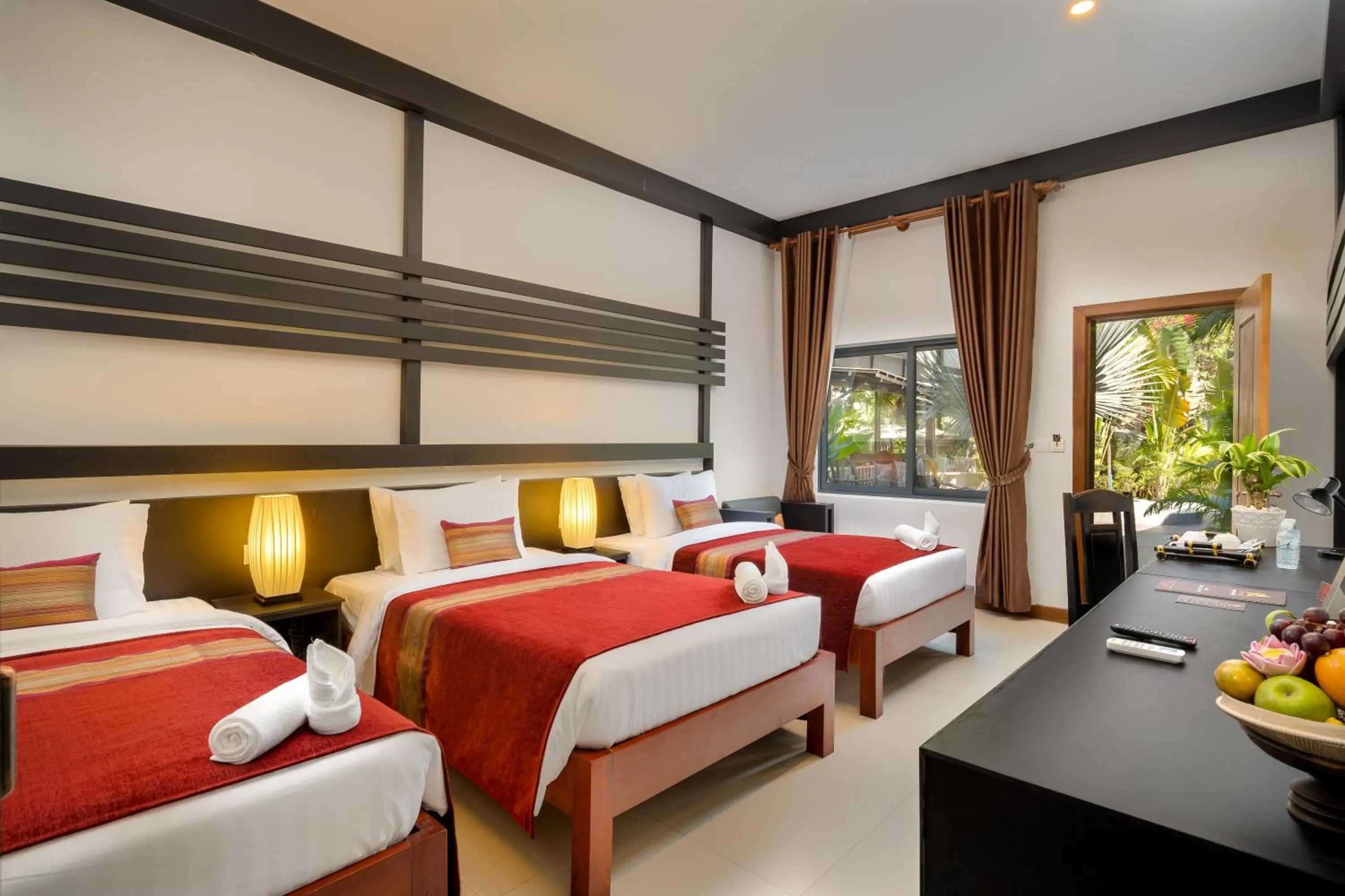 Deluxe Triple Room in Reveal Angkor Hotel