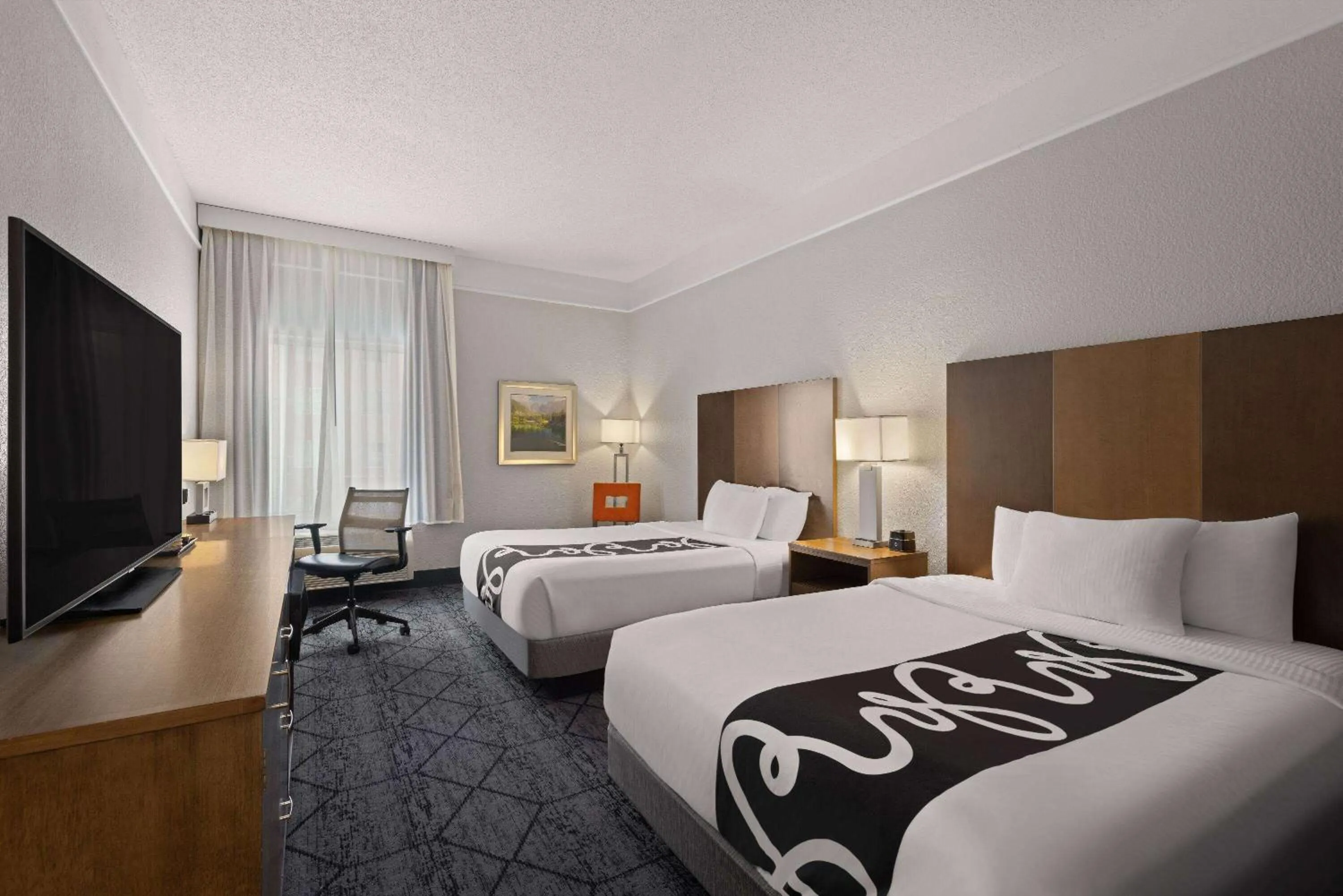 Deluxe Queen Room with Two Queen Beds in La Quinta Inn and Suites by Wyndham at WaTiki Waterpark