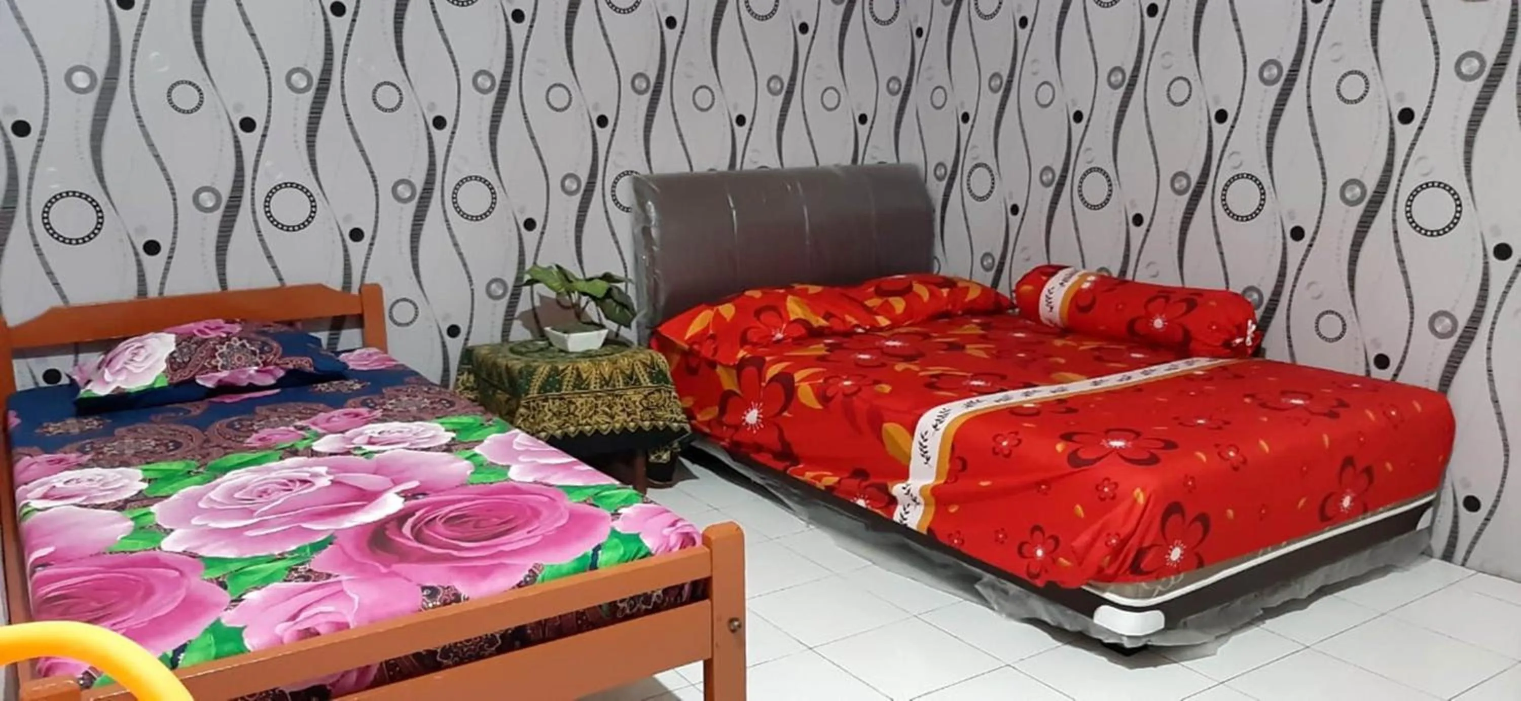 Deluxe Room in Dharmawati Homestay Syariah at Terminal Purabaya