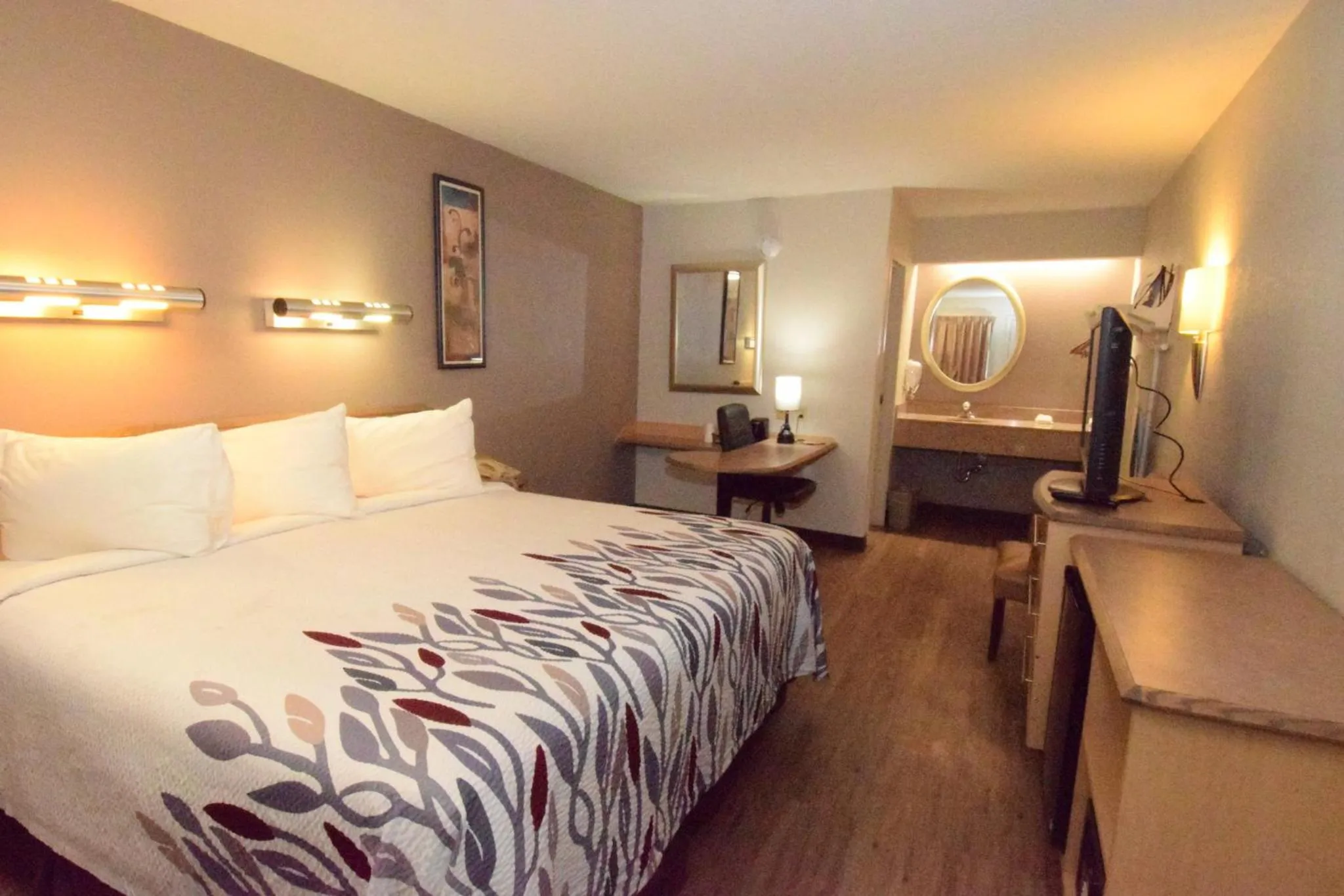 Superior King Room Disability Access Roll-In Shower Smoke Free in Red Roof Inn Buffalo - Hamburg/ I-90