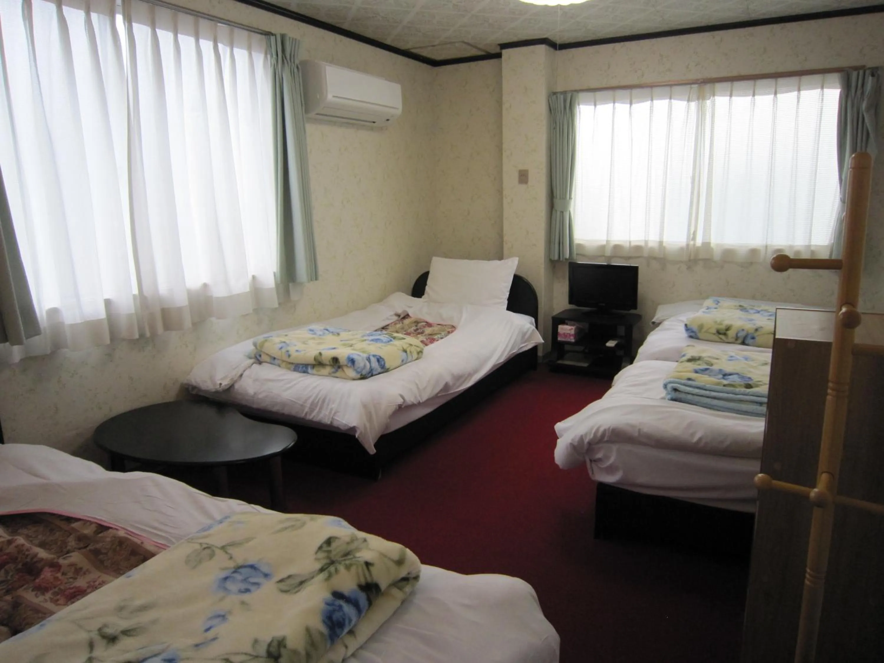Quadruple Room with Shared Bathroom in Pension Kitashirakawa