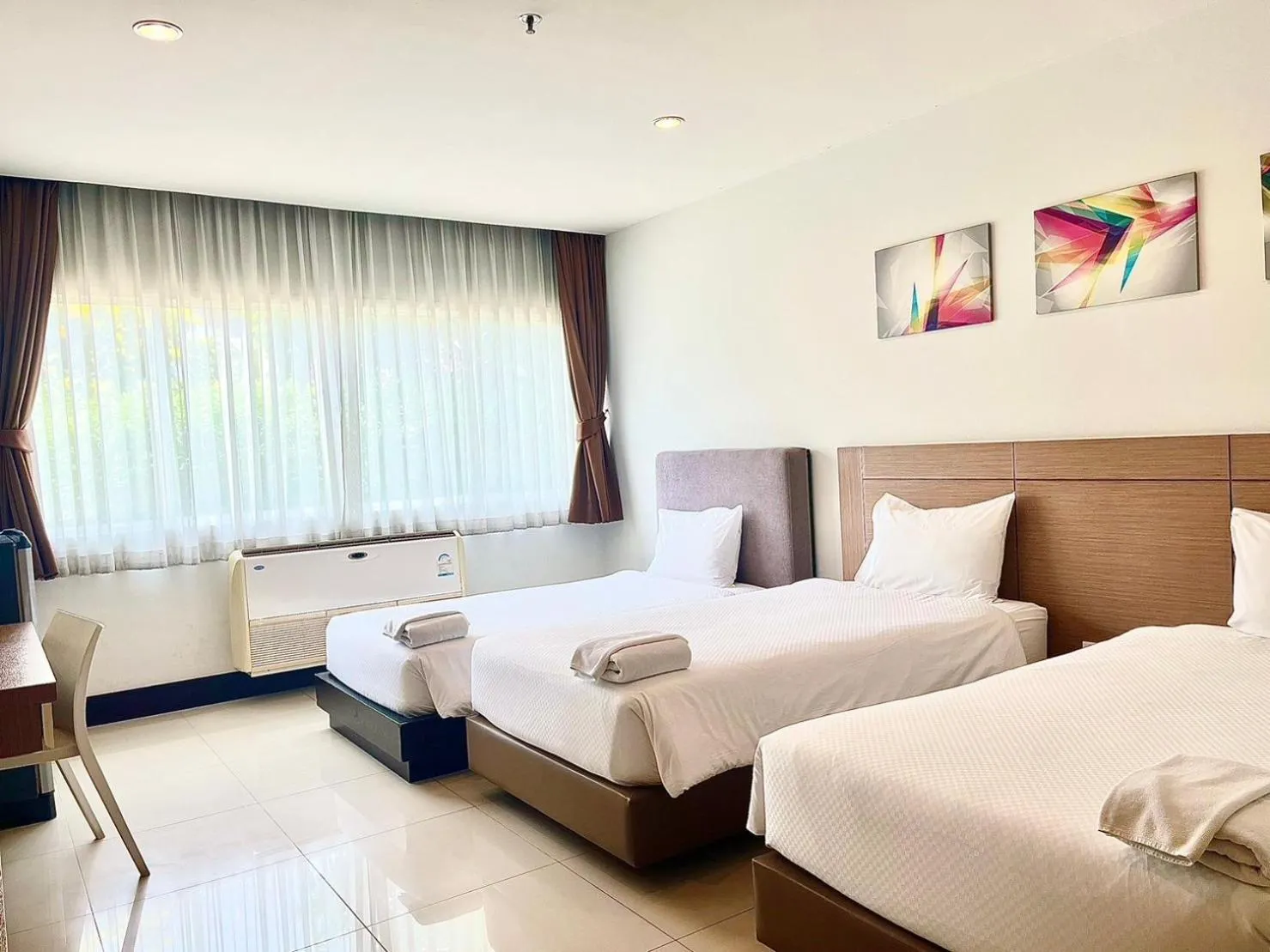 Triple Room with Shower in Crystal Suites Suvarnbhumi Airport