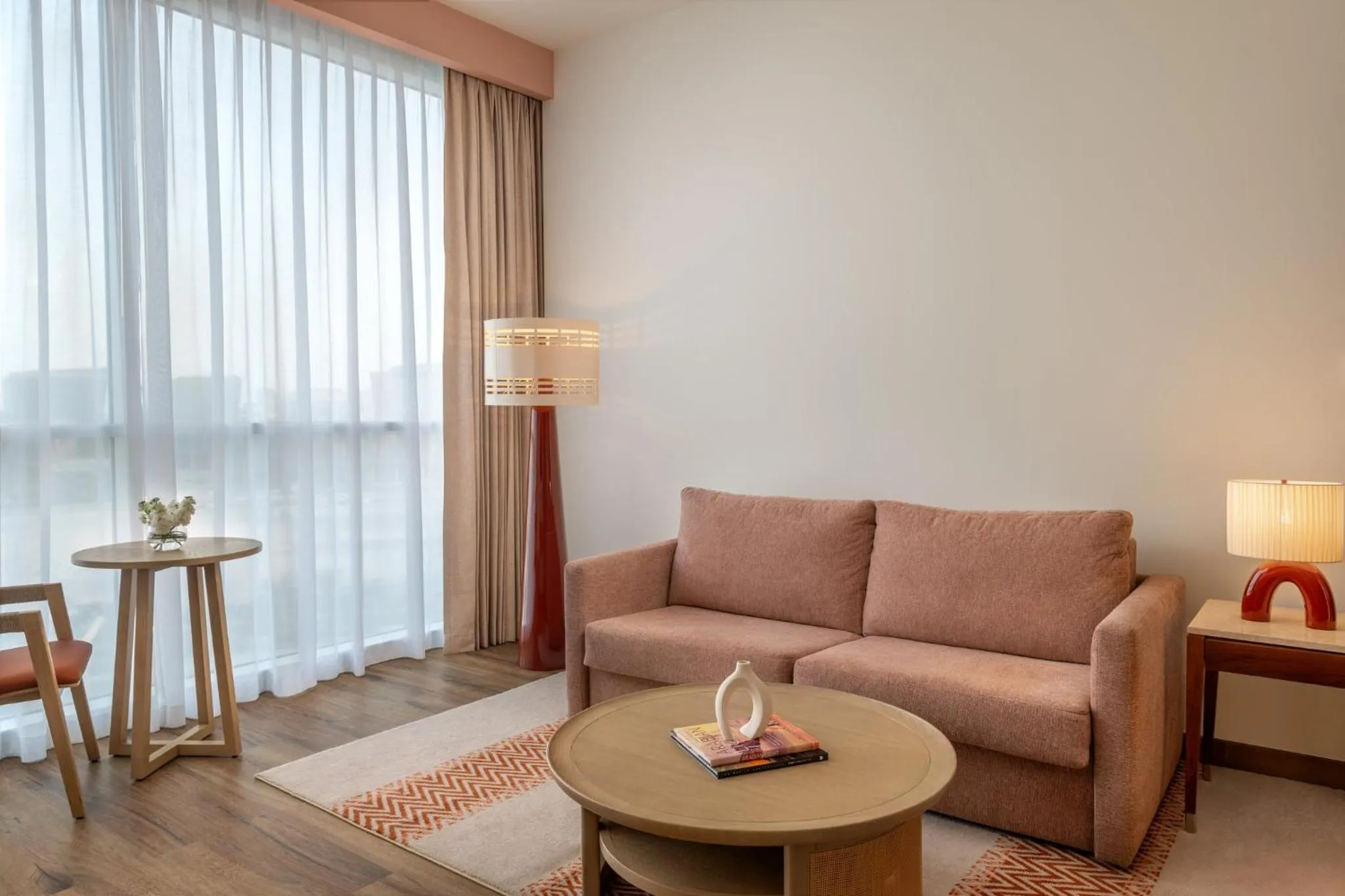 Family Suite Room with One Queen Bed, Sofa Bed and Pool View Theme Park Access in Yas Plaza Circuit by IHG