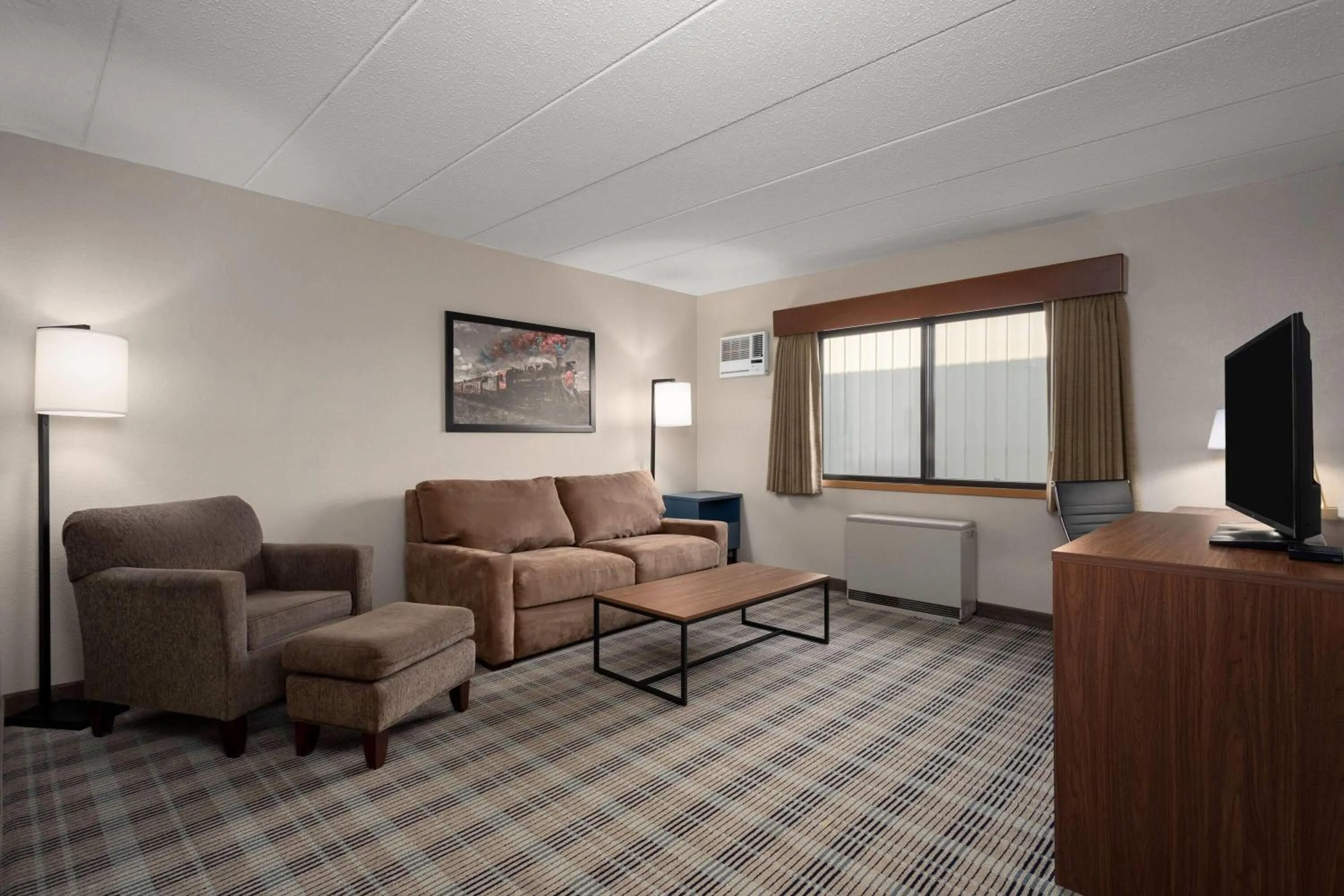 Deluxe King Suite in AmericInn by Wyndham Roseau