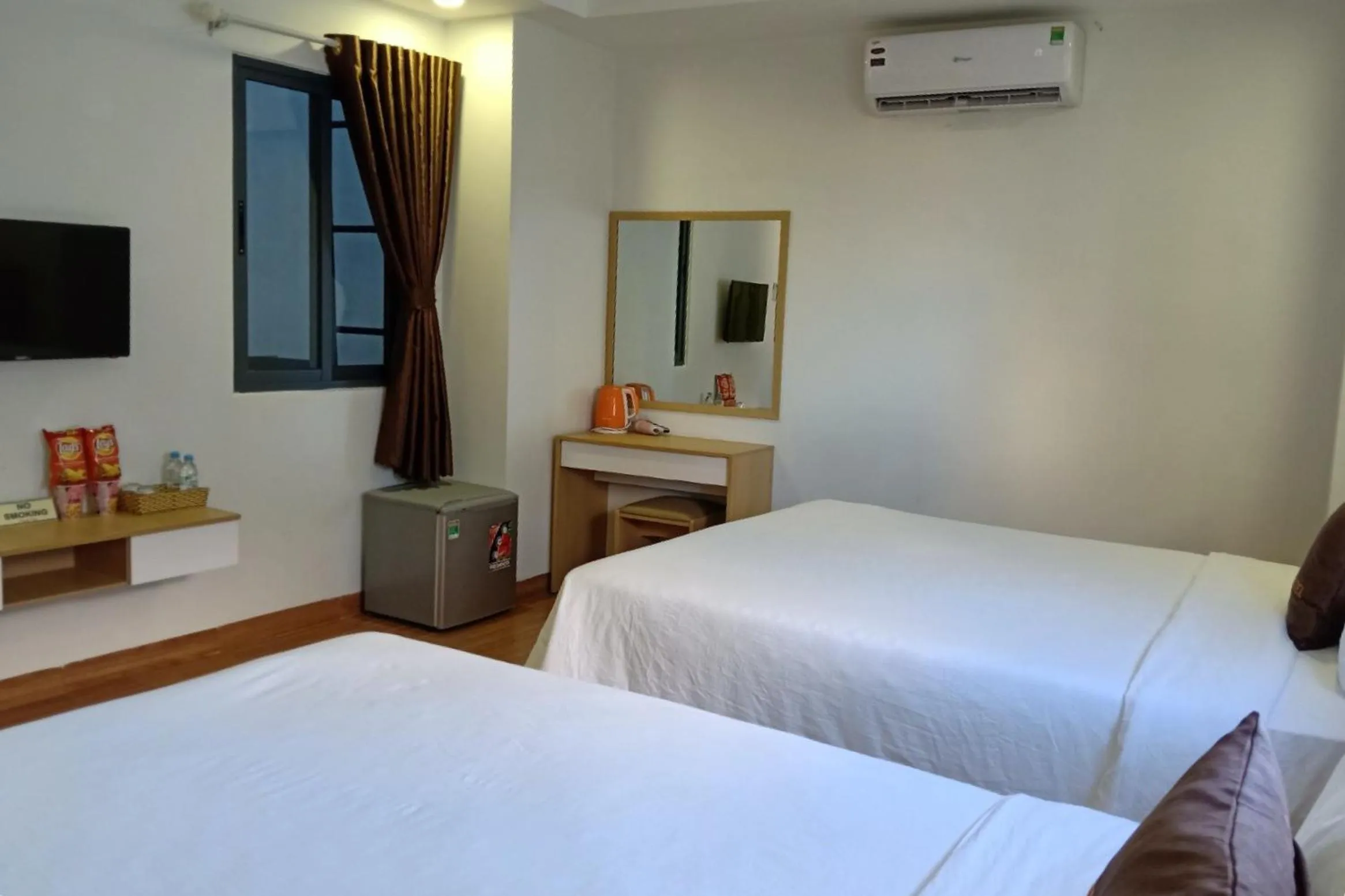 Standard Quadruple Room in Galaxy Hotel