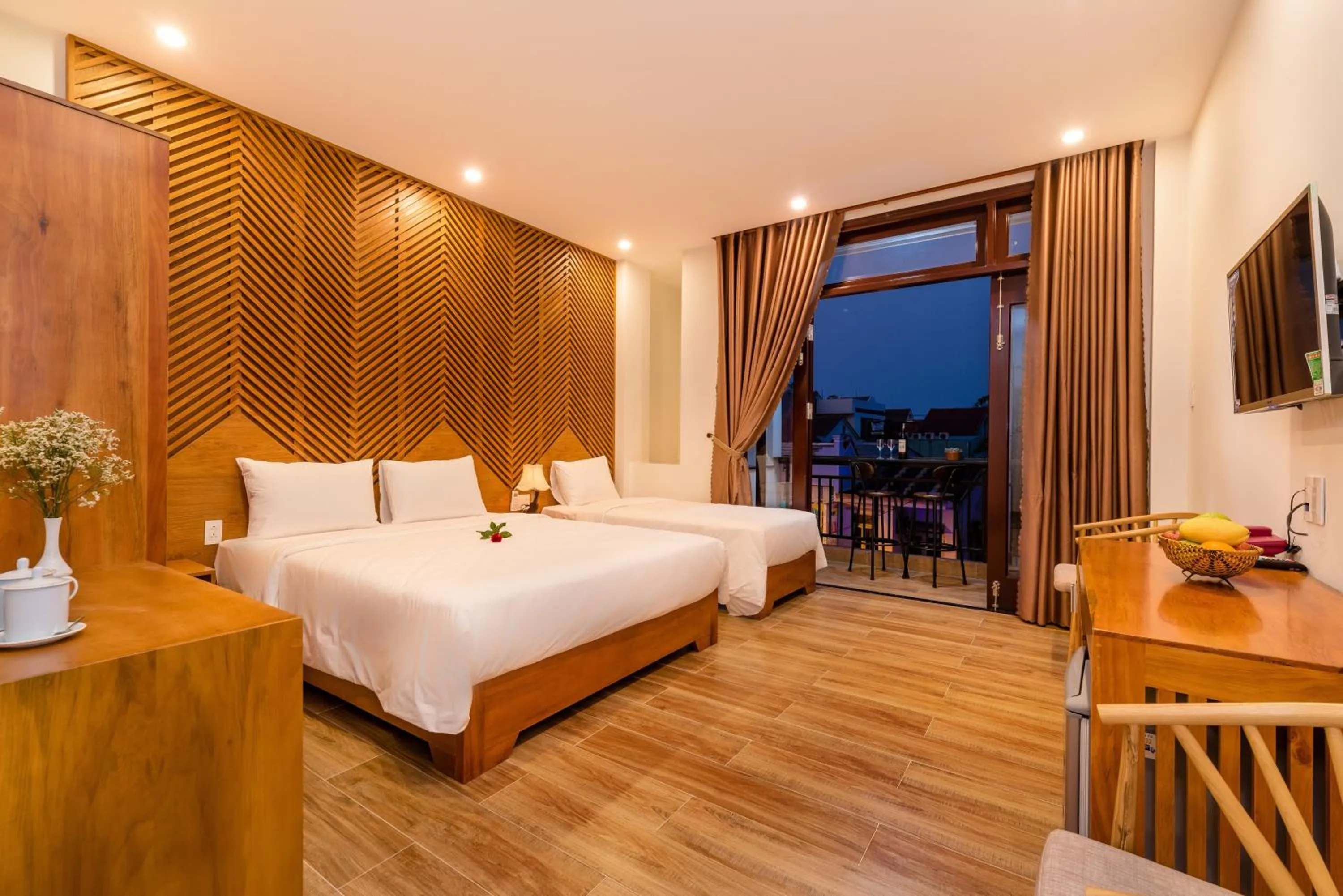 Deluxe Triple Room with Balcony in Phong Phu Villa Hoi An