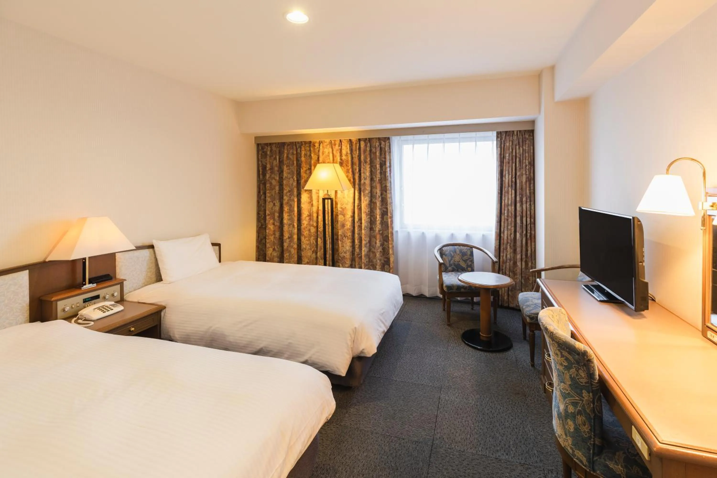 Standard Twin Room - single occupancy - Smoking in Hotel Sunroute Niigata